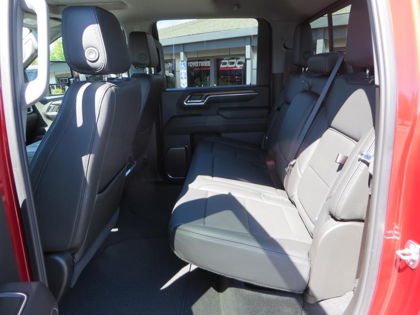 2024 Volcanic Red /Black GMC Sierra 2500HD Denali Crew Cab 4WD SB (1GT49REY6RF) with an 6.6L V8 OHV 16V TURBO DIESEL engine, 6A transmission, located at 2630 Grass Valley Highway, Auburn, CA, 95603, (530) 508-5100, 38.937893, -121.095482 - Denali 2500 featuring a Cognito Level kit, Fox shocks, 20" Fittipaldi FA18 wheels, 35" Nitto Ridge Grappler tires, and a LineX folding tonneau cover. - Photo#51