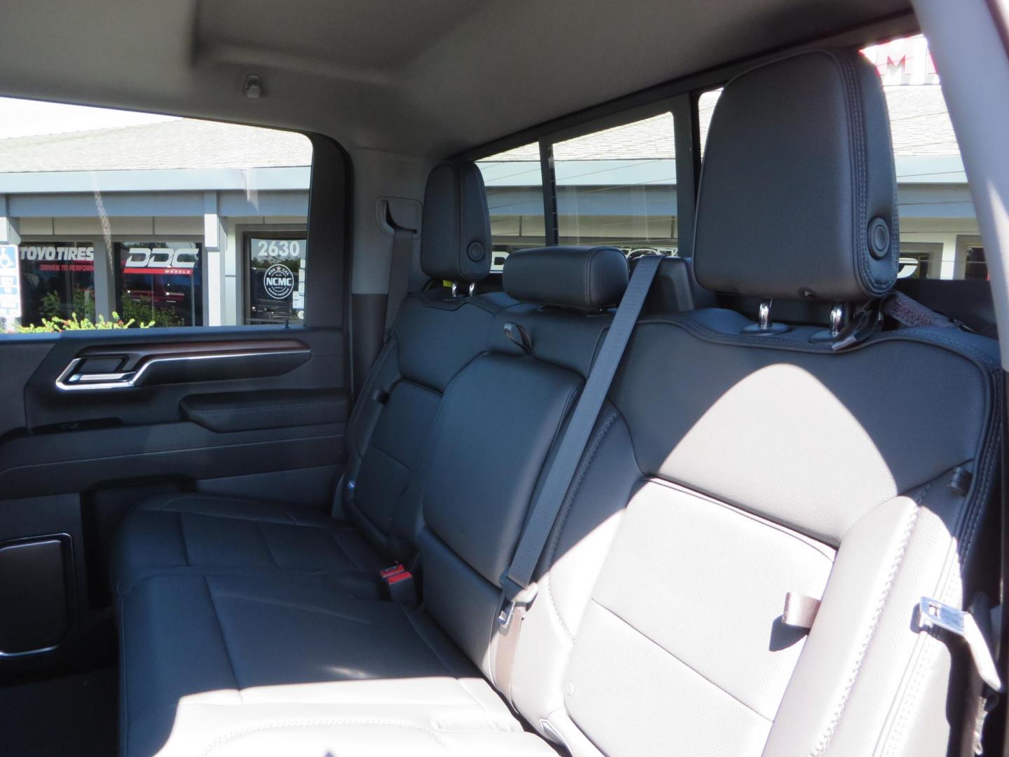 2024 Volcanic Red /Black GMC Sierra 2500HD Denali Crew Cab 4WD SB (1GT49REY6RF) with an 6.6L V8 OHV 16V TURBO DIESEL engine, 6A transmission, located at 2630 Grass Valley Highway, Auburn, CA, 95603, (530) 508-5100, 38.937893, -121.095482 - Denali 2500 featuring a Cognito Level kit, Fox shocks, 20" Fittipaldi FA18 wheels, 35" Nitto Ridge Grappler tires, and a LineX folding tonneau cover. - Photo#52