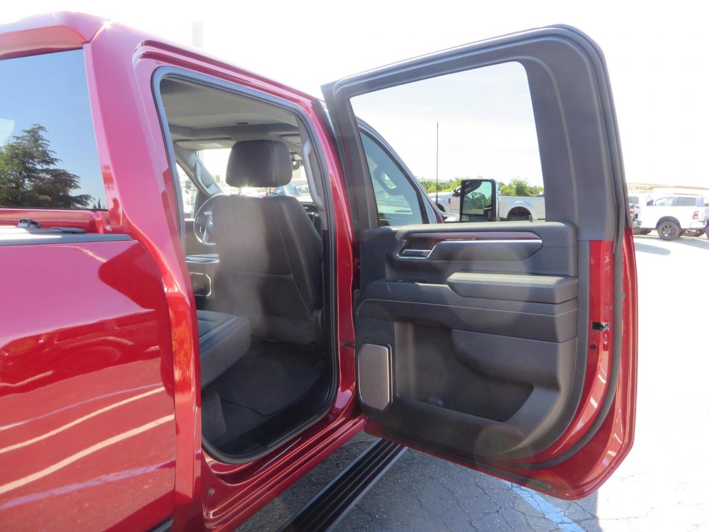 2024 Volcanic Red /Black GMC Sierra 2500HD Denali Crew Cab 4WD SB (1GT49REY6RF) with an 6.6L V8 OHV 16V TURBO DIESEL engine, 6A transmission, located at 2630 Grass Valley Highway, Auburn, CA, 95603, (530) 508-5100, 38.937893, -121.095482 - Denali 2500 featuring a Cognito Level kit, Fox shocks, 20" Fittipaldi FA18 wheels, 35" Nitto Ridge Grappler tires, and a LineX folding tonneau cover. - Photo#64