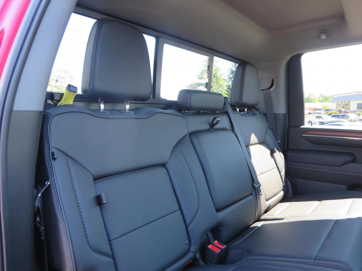 2024 Volcanic Red /Black GMC Sierra 2500HD Denali Crew Cab 4WD SB (1GT49REY6RF) with an 6.6L V8 OHV 16V TURBO DIESEL engine, 6A transmission, located at 2630 Grass Valley Highway, Auburn, CA, 95603, (530) 508-5100, 38.937893, -121.095482 - Denali 2500 featuring a Cognito Level kit, Fox shocks, 20" Fittipaldi FA18 wheels, 35" Nitto Ridge Grappler tires, and a LineX folding tonneau cover. - Photo#68