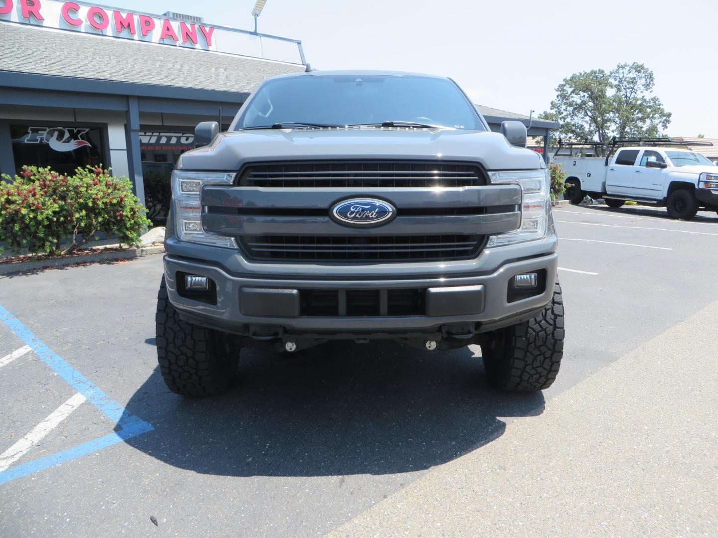 2018 Ford F-150 Lariat SuperCrew 5.5-ft. Bed 4WD (1FTEW1EG6JF) with an 3.5L V6 TURBO engine, 6A transmission, located at 2630 Grass Valley Highway, Auburn, CA, 95603, (530) 508-5100, 38.937893, -121.095482 - Sitting on a 6" Rough Country lift kit, Fox 2.5 remote reservoir coilovers, 18" Fuel Rebel wheels, 35" Toyo AT3 tires, Tonneau Cover, bed side swing case, and window tint. - Photo#1