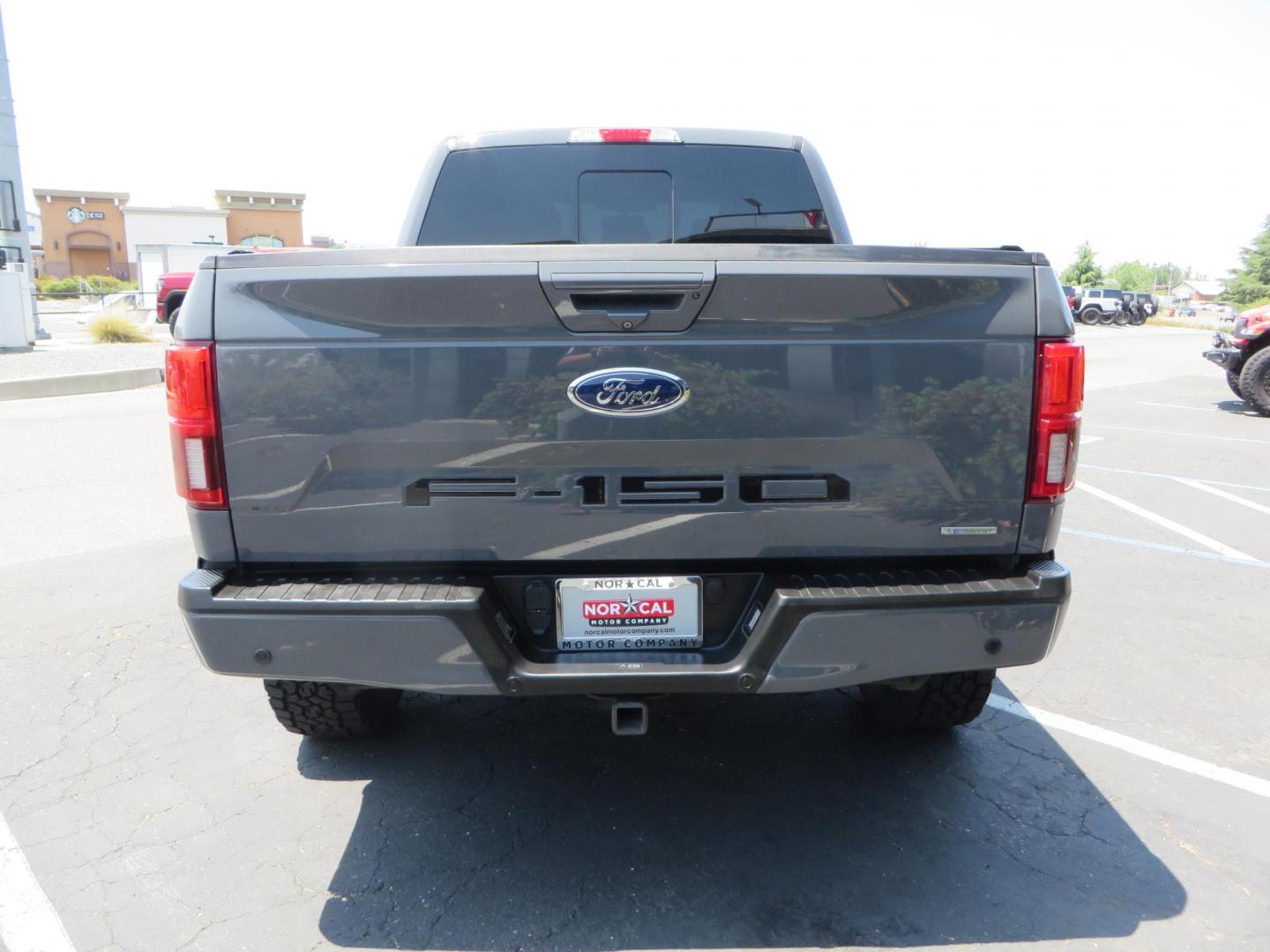 2018 Ford F-150 Lariat SuperCrew 5.5-ft. Bed 4WD (1FTEW1EG6JF) with an 3.5L V6 TURBO engine, 6A transmission, located at 2630 Grass Valley Highway, Auburn, CA, 95603, (530) 508-5100, 38.937893, -121.095482 - Sitting on a 6" Rough Country lift kit, Fox 2.5 remote reservoir coilovers, 18" Fuel Rebel wheels, 35" Toyo AT3 tires, Tonneau Cover, bed side swing case, and window tint. - Photo#5