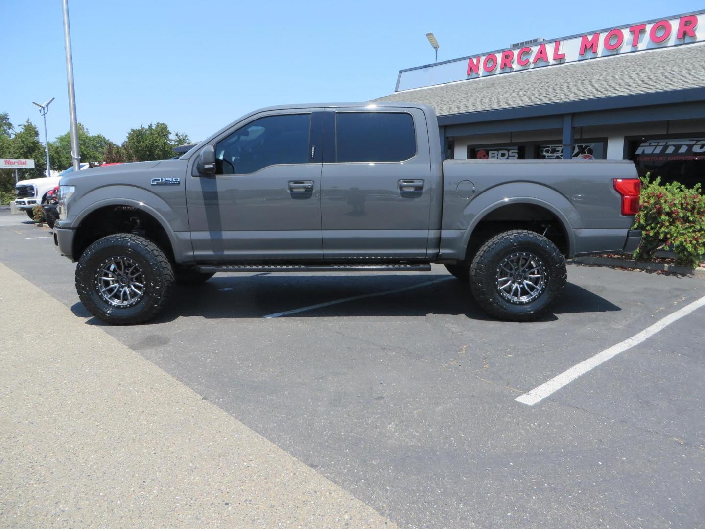 2018 Ford F-150 Lariat SuperCrew 5.5-ft. Bed 4WD (1FTEW1EG6JF) with an 3.5L V6 TURBO engine, 6A transmission, located at 2630 Grass Valley Highway, Auburn, CA, 95603, (530) 508-5100, 38.937893, -121.095482 - Sitting on a 6" Rough Country lift kit, Fox 2.5 remote reservoir coilovers, 18" Fuel Rebel wheels, 35" Toyo AT3 tires, Tonneau Cover, bed side swing case, and window tint. - Photo#7