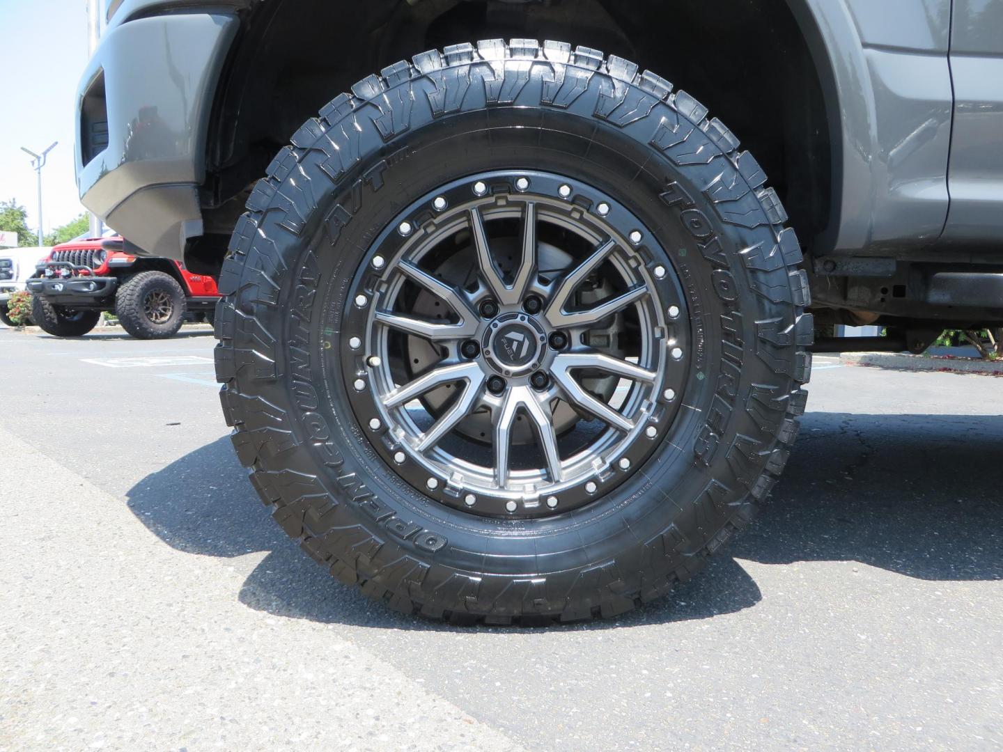 2018 Ford F-150 Lariat SuperCrew 5.5-ft. Bed 4WD (1FTEW1EG6JF) with an 3.5L V6 TURBO engine, 6A transmission, located at 2630 Grass Valley Highway, Auburn, CA, 95603, (530) 508-5100, 38.937893, -121.095482 - Sitting on a 6" Rough Country lift kit, Fox 2.5 remote reservoir coilovers, 18" Fuel Rebel wheels, 35" Toyo AT3 tires, Tonneau Cover, bed side swing case, and window tint. - Photo#8