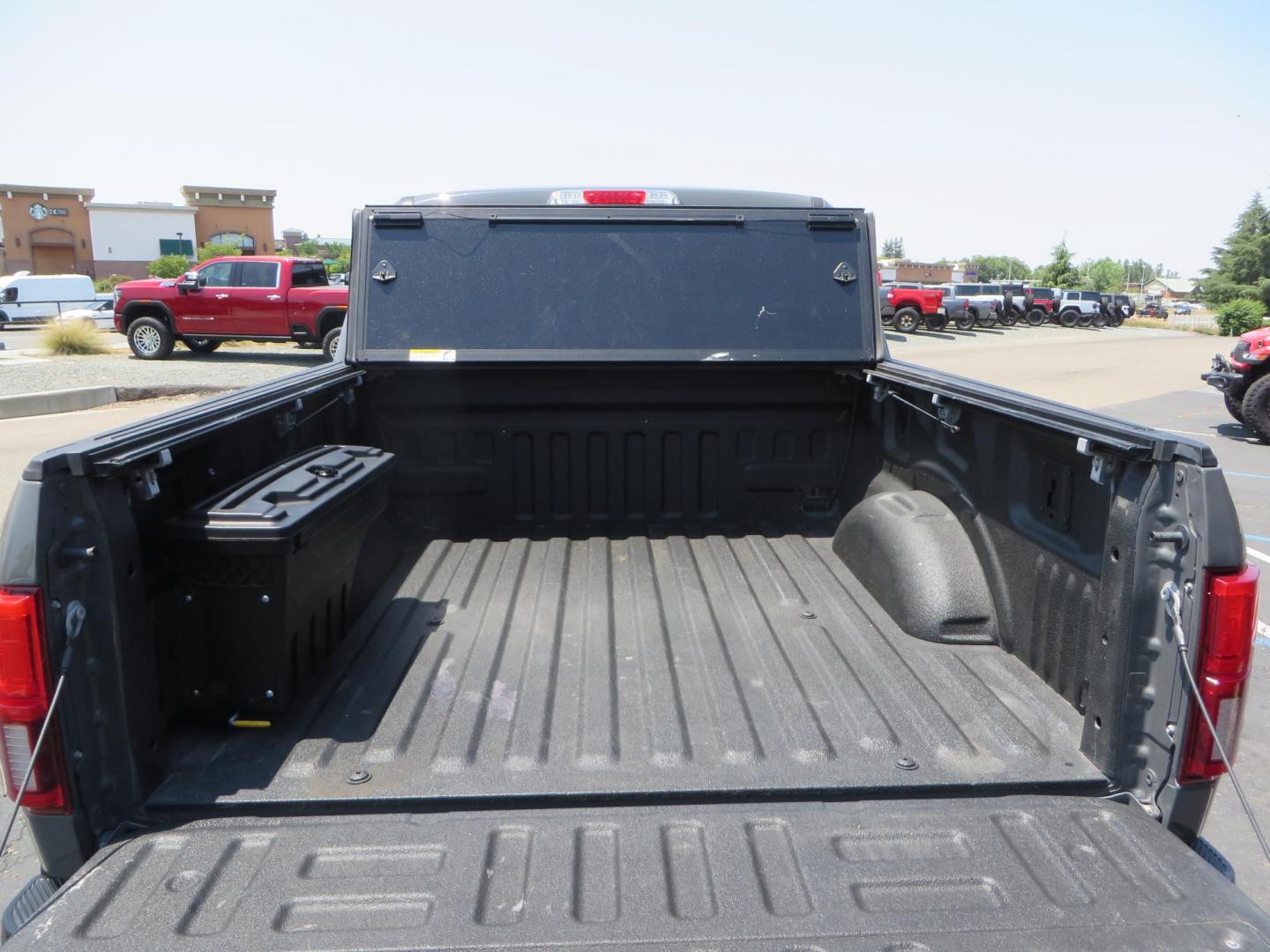 2018 Ford F-150 Lariat SuperCrew 5.5-ft. Bed 4WD (1FTEW1EG6JF) with an 3.5L V6 TURBO engine, 6A transmission, located at 2630 Grass Valley Highway, Auburn, CA, 95603, (530) 508-5100, 38.937893, -121.095482 - Sitting on a 6" Rough Country lift kit, Fox 2.5 remote reservoir coilovers, 18" Fuel Rebel wheels, 35" Toyo AT3 tires, Tonneau Cover, bed side swing case, and window tint. - Photo#12