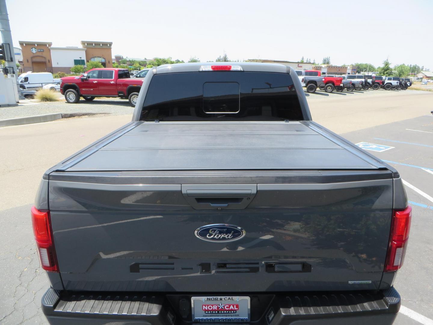 2018 Ford F-150 Lariat SuperCrew 5.5-ft. Bed 4WD (1FTEW1EG6JF) with an 3.5L V6 TURBO engine, 6A transmission, located at 2630 Grass Valley Highway, Auburn, CA, 95603, (530) 508-5100, 38.937893, -121.095482 - Sitting on a 6" Rough Country lift kit, Fox 2.5 remote reservoir coilovers, 18" Fuel Rebel wheels, 35" Toyo AT3 tires, Tonneau Cover, bed side swing case, and window tint. - Photo#11