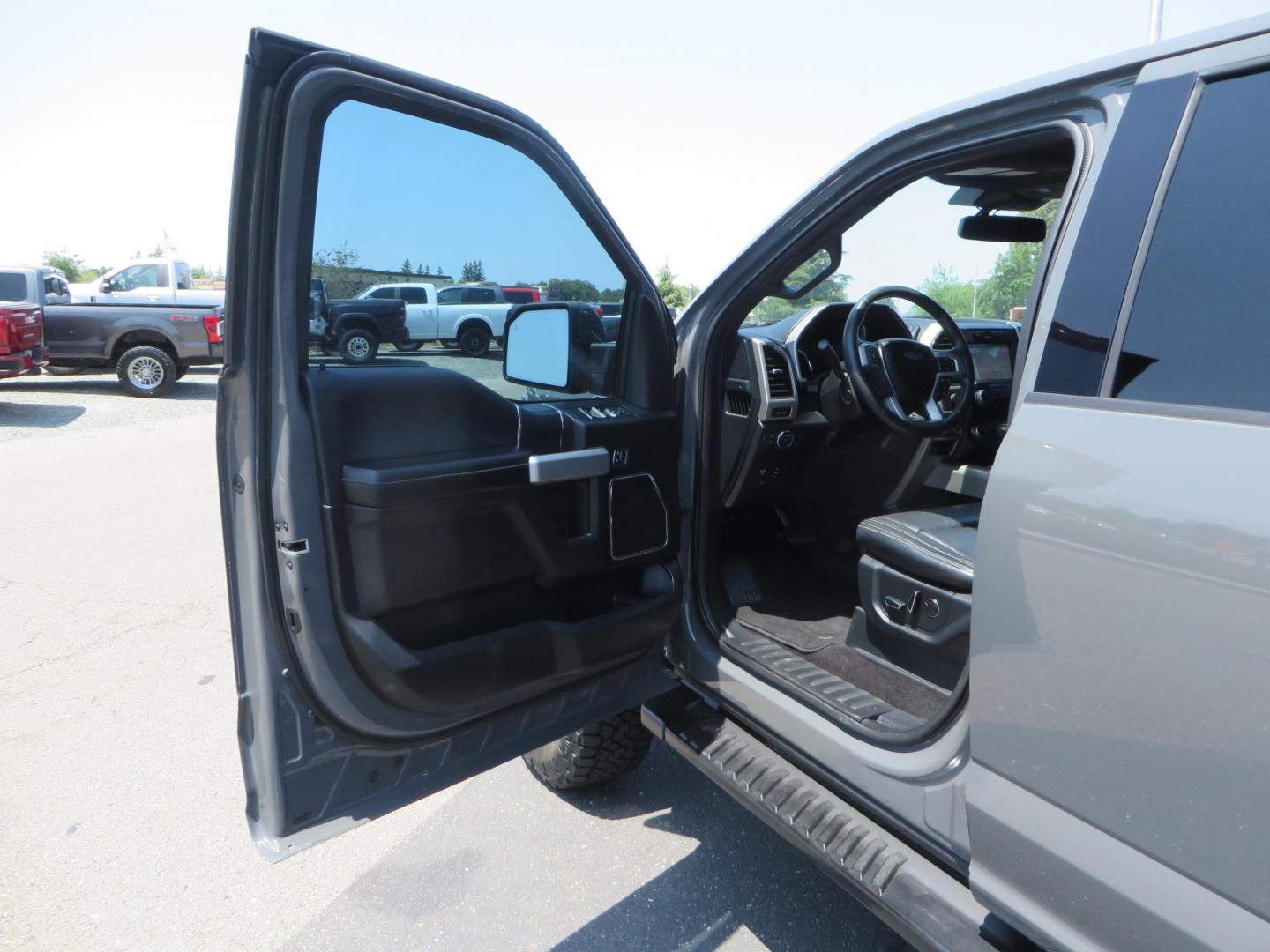 2018 Ford F-150 Lariat SuperCrew 5.5-ft. Bed 4WD (1FTEW1EG6JF) with an 3.5L V6 TURBO engine, 6A transmission, located at 2630 Grass Valley Highway, Auburn, CA, 95603, (530) 508-5100, 38.937893, -121.095482 - Sitting on a 6" Rough Country lift kit, Fox 2.5 remote reservoir coilovers, 18" Fuel Rebel wheels, 35" Toyo AT3 tires, Tonneau Cover, bed side swing case, and window tint. - Photo#18