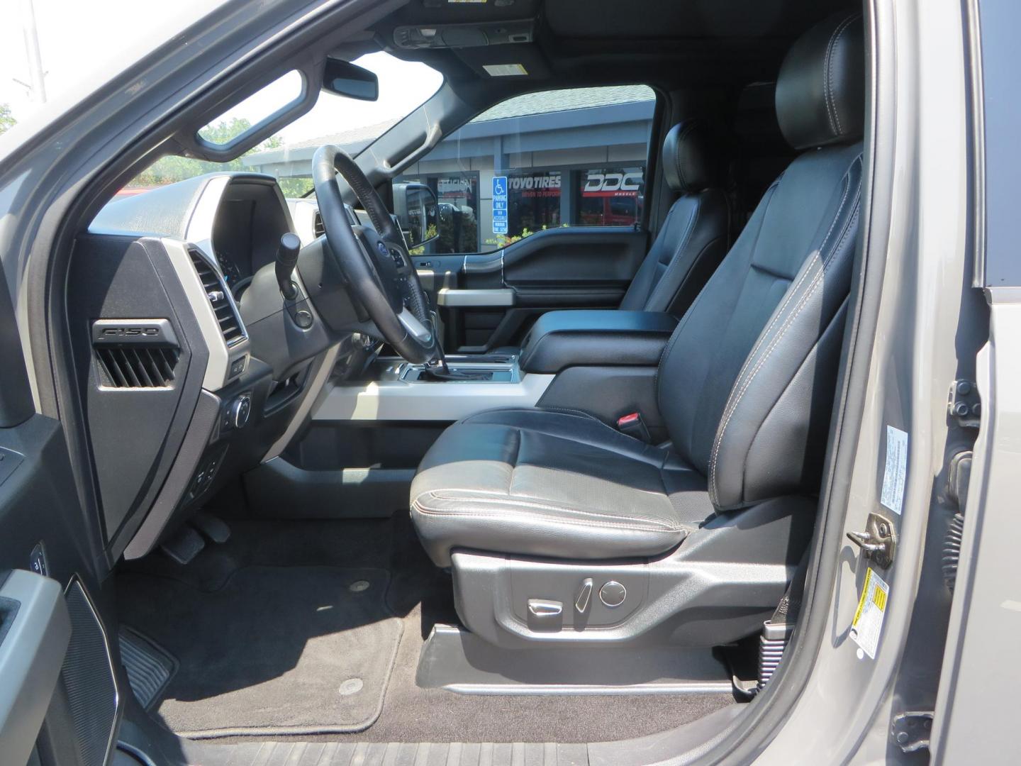 2018 Ford F-150 Lariat SuperCrew 5.5-ft. Bed 4WD (1FTEW1EG6JF) with an 3.5L V6 TURBO engine, 6A transmission, located at 2630 Grass Valley Highway, Auburn, CA, 95603, (530) 508-5100, 38.937893, -121.095482 - Sitting on a 6" Rough Country lift kit, Fox 2.5 remote reservoir coilovers, 18" Fuel Rebel wheels, 35" Toyo AT3 tires, Tonneau Cover, bed side swing case, and window tint. - Photo#21