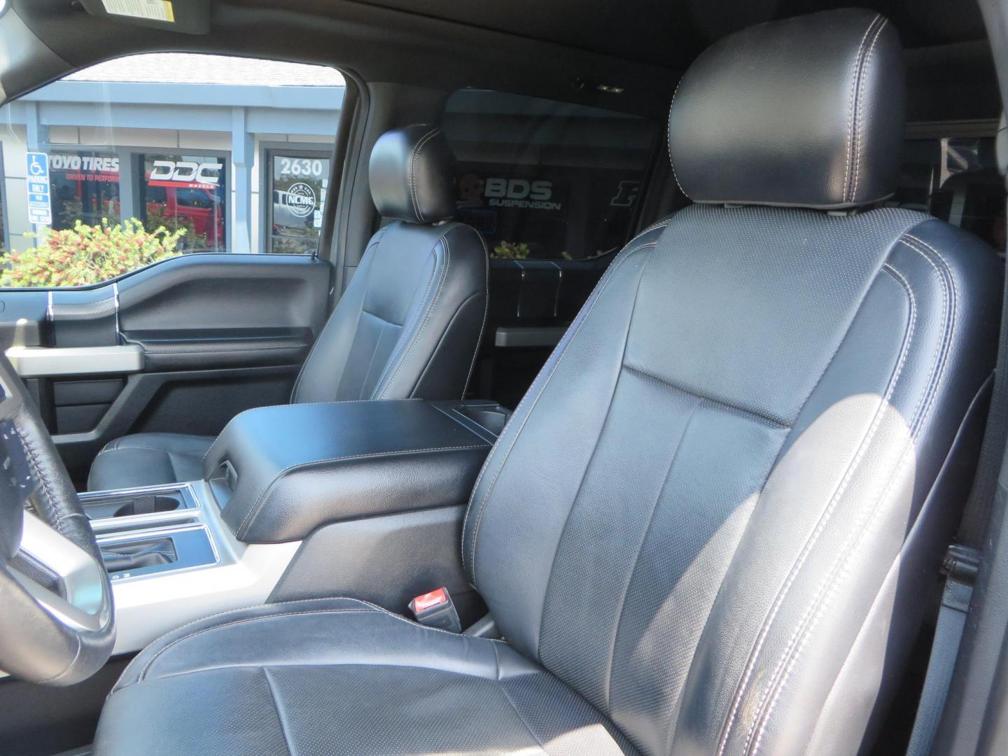 2018 Ford F-150 Lariat SuperCrew 5.5-ft. Bed 4WD (1FTEW1EG6JF) with an 3.5L V6 TURBO engine, 6A transmission, located at 2630 Grass Valley Highway, Auburn, CA, 95603, (530) 508-5100, 38.937893, -121.095482 - Sitting on a 6" Rough Country lift kit, Fox 2.5 remote reservoir coilovers, 18" Fuel Rebel wheels, 35" Toyo AT3 tires, Tonneau Cover, bed side swing case, and window tint. - Photo#22