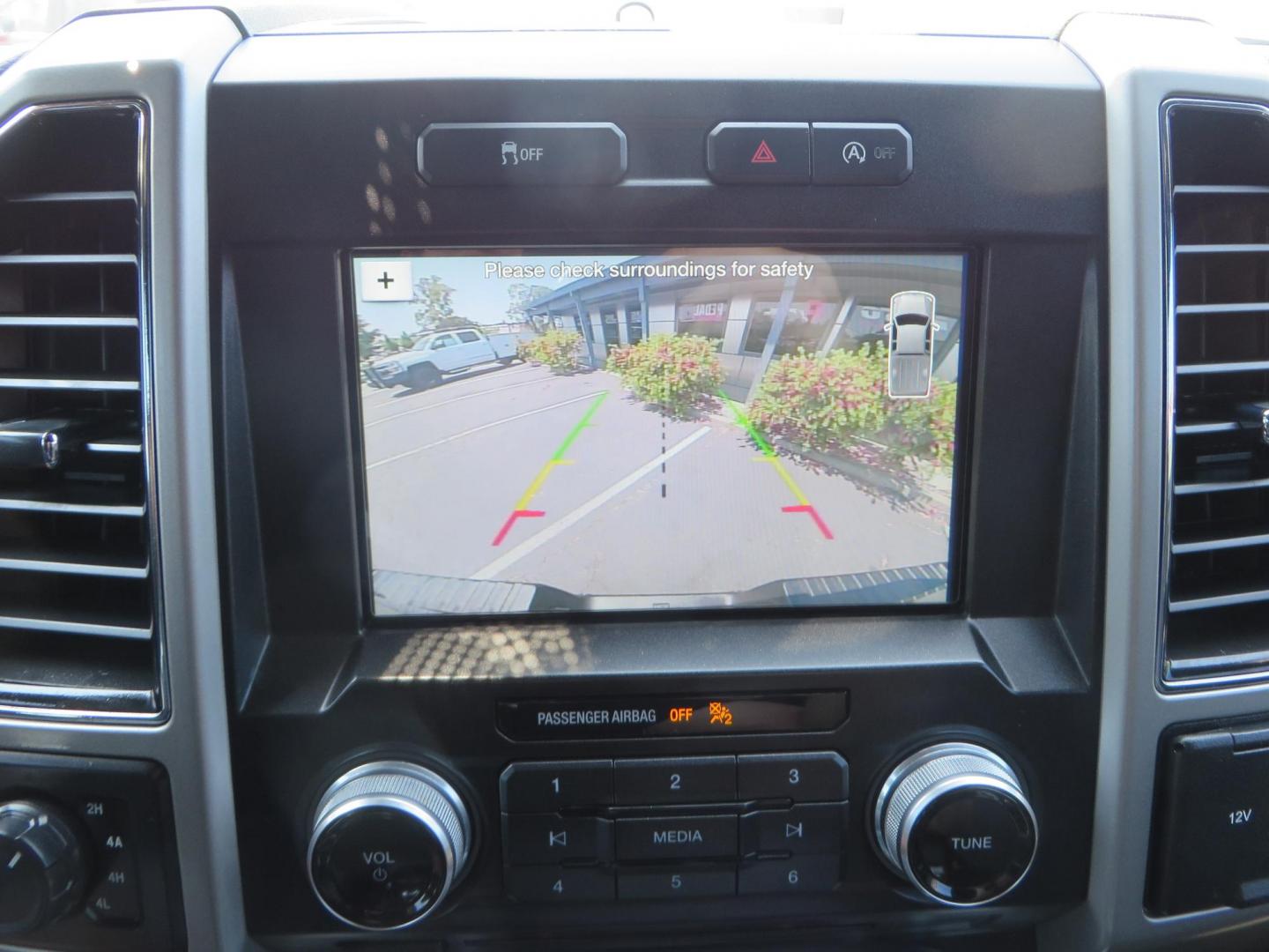 2018 Ford F-150 Lariat SuperCrew 5.5-ft. Bed 4WD (1FTEW1EG6JF) with an 3.5L V6 TURBO engine, 6A transmission, located at 2630 Grass Valley Highway, Auburn, CA, 95603, (530) 508-5100, 38.937893, -121.095482 - Sitting on a 6" Rough Country lift kit, Fox 2.5 remote reservoir coilovers, 18" Fuel Rebel wheels, 35" Toyo AT3 tires, Tonneau Cover, bed side swing case, and window tint. - Photo#32