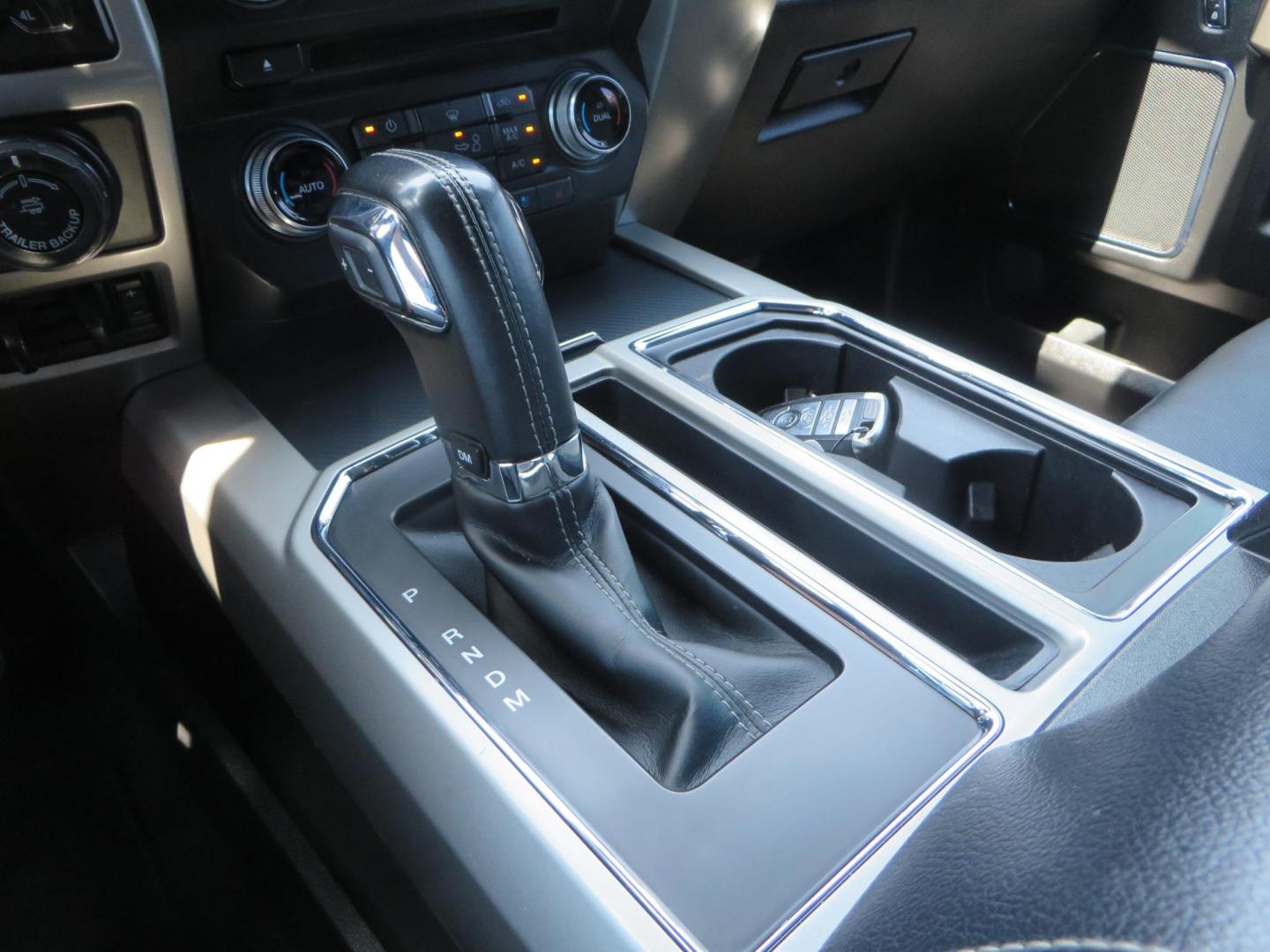 2018 Ford F-150 Lariat SuperCrew 5.5-ft. Bed 4WD (1FTEW1EG6JF) with an 3.5L V6 TURBO engine, 6A transmission, located at 2630 Grass Valley Highway, Auburn, CA, 95603, (530) 508-5100, 38.937893, -121.095482 - Sitting on a 6" Rough Country lift kit, Fox 2.5 remote reservoir coilovers, 18" Fuel Rebel wheels, 35" Toyo AT3 tires, Tonneau Cover, bed side swing case, and window tint. - Photo#39