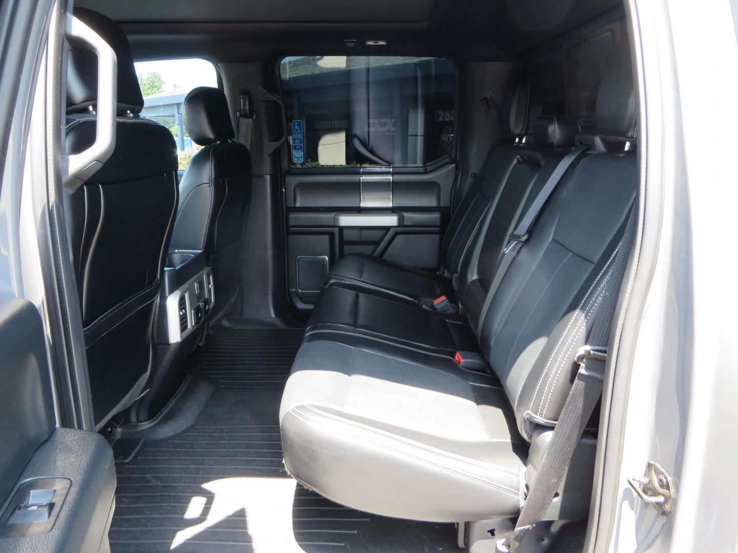 2018 Ford F-150 Lariat SuperCrew 5.5-ft. Bed 4WD (1FTEW1EG6JF) with an 3.5L V6 TURBO engine, 6A transmission, located at 2630 Grass Valley Highway, Auburn, CA, 95603, (530) 508-5100, 38.937893, -121.095482 - Sitting on a 6" Rough Country lift kit, Fox 2.5 remote reservoir coilovers, 18" Fuel Rebel wheels, 35" Toyo AT3 tires, Tonneau Cover, bed side swing case, and window tint. - Photo#50