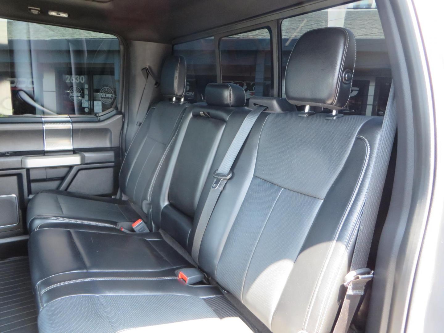 2018 Ford F-150 Lariat SuperCrew 5.5-ft. Bed 4WD (1FTEW1EG6JF) with an 3.5L V6 TURBO engine, 6A transmission, located at 2630 Grass Valley Highway, Auburn, CA, 95603, (530) 508-5100, 38.937893, -121.095482 - Sitting on a 6" Rough Country lift kit, Fox 2.5 remote reservoir coilovers, 18" Fuel Rebel wheels, 35" Toyo AT3 tires, Tonneau Cover, bed side swing case, and window tint. - Photo#51