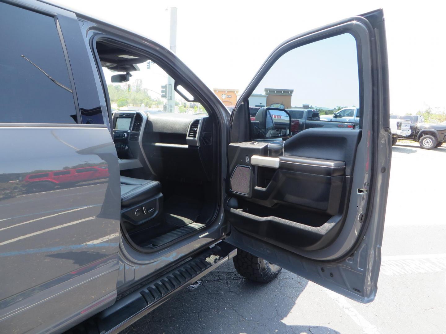 2018 Ford F-150 Lariat SuperCrew 5.5-ft. Bed 4WD (1FTEW1EG6JF) with an 3.5L V6 TURBO engine, 6A transmission, located at 2630 Grass Valley Highway, Auburn, CA, 95603, (530) 508-5100, 38.937893, -121.095482 - Sitting on a 6" Rough Country lift kit, Fox 2.5 remote reservoir coilovers, 18" Fuel Rebel wheels, 35" Toyo AT3 tires, Tonneau Cover, bed side swing case, and window tint. - Photo#54