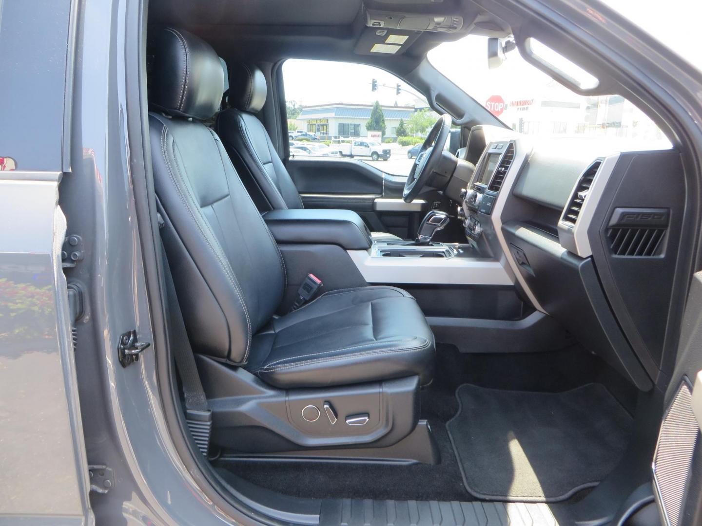 2018 Ford F-150 Lariat SuperCrew 5.5-ft. Bed 4WD (1FTEW1EG6JF) with an 3.5L V6 TURBO engine, 6A transmission, located at 2630 Grass Valley Highway, Auburn, CA, 95603, (530) 508-5100, 38.937893, -121.095482 - Sitting on a 6" Rough Country lift kit, Fox 2.5 remote reservoir coilovers, 18" Fuel Rebel wheels, 35" Toyo AT3 tires, Tonneau Cover, bed side swing case, and window tint. - Photo#57