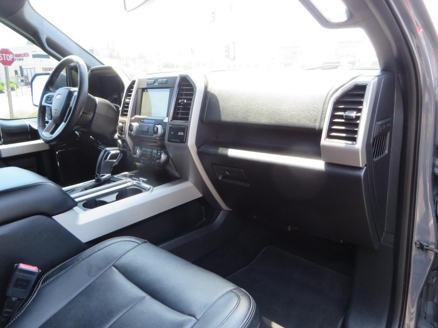 2018 Ford F-150 Lariat SuperCrew 5.5-ft. Bed 4WD (1FTEW1EG6JF) with an 3.5L V6 TURBO engine, 6A transmission, located at 2630 Grass Valley Highway, Auburn, CA, 95603, (530) 508-5100, 38.937893, -121.095482 - Sitting on a 6" Rough Country lift kit, Fox 2.5 remote reservoir coilovers, 18" Fuel Rebel wheels, 35" Toyo AT3 tires, Tonneau Cover, bed side swing case, and window tint. - Photo#60