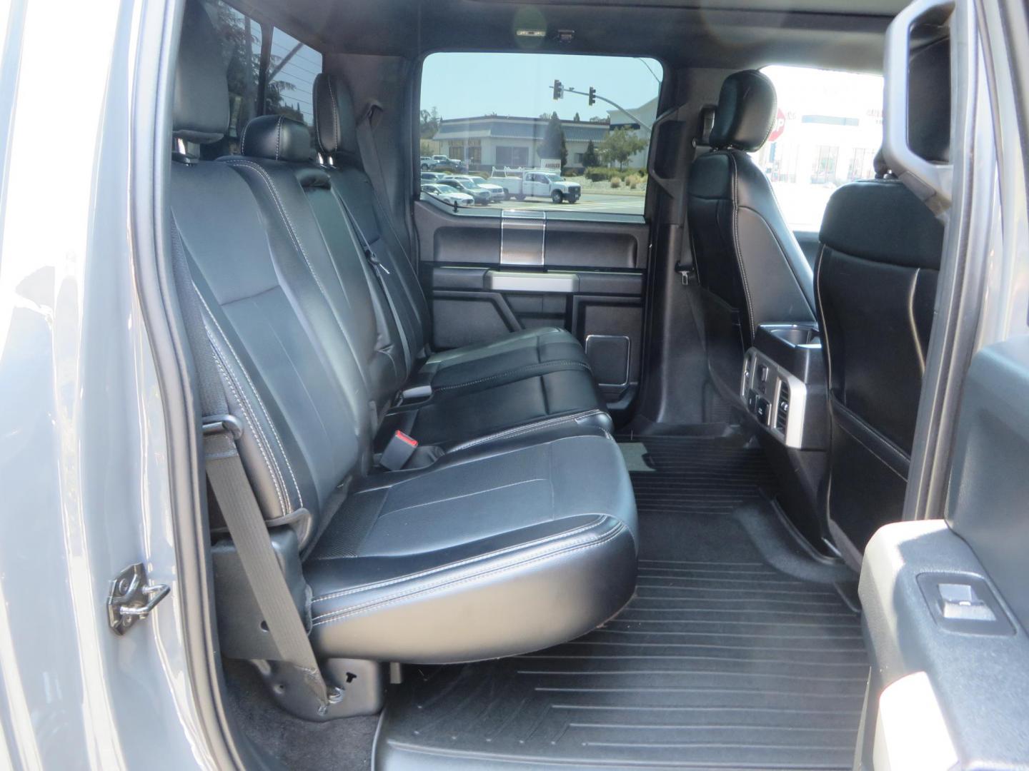 2018 Ford F-150 Lariat SuperCrew 5.5-ft. Bed 4WD (1FTEW1EG6JF) with an 3.5L V6 TURBO engine, 6A transmission, located at 2630 Grass Valley Highway, Auburn, CA, 95603, (530) 508-5100, 38.937893, -121.095482 - Sitting on a 6" Rough Country lift kit, Fox 2.5 remote reservoir coilovers, 18" Fuel Rebel wheels, 35" Toyo AT3 tires, Tonneau Cover, bed side swing case, and window tint. - Photo#64
