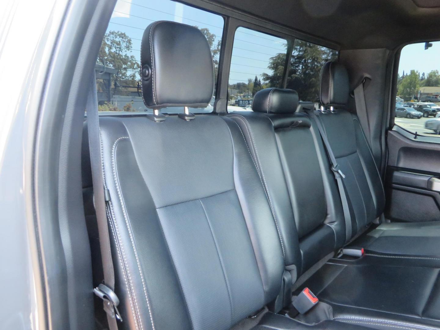 2018 Ford F-150 Lariat SuperCrew 5.5-ft. Bed 4WD (1FTEW1EG6JF) with an 3.5L V6 TURBO engine, 6A transmission, located at 2630 Grass Valley Highway, Auburn, CA, 95603, (530) 508-5100, 38.937893, -121.095482 - Sitting on a 6" Rough Country lift kit, Fox 2.5 remote reservoir coilovers, 18" Fuel Rebel wheels, 35" Toyo AT3 tires, Tonneau Cover, bed side swing case, and window tint. - Photo#65