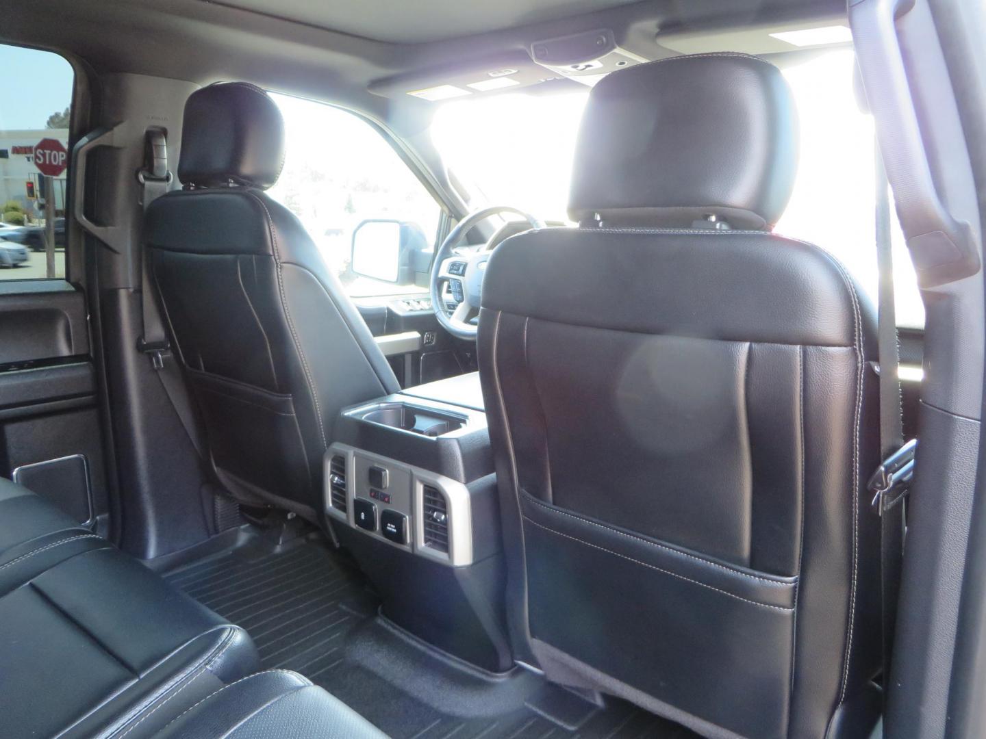 2018 Ford F-150 Lariat SuperCrew 5.5-ft. Bed 4WD (1FTEW1EG6JF) with an 3.5L V6 TURBO engine, 6A transmission, located at 2630 Grass Valley Highway, Auburn, CA, 95603, (530) 508-5100, 38.937893, -121.095482 - Sitting on a 6" Rough Country lift kit, Fox 2.5 remote reservoir coilovers, 18" Fuel Rebel wheels, 35" Toyo AT3 tires, Tonneau Cover, bed side swing case, and window tint. - Photo#67