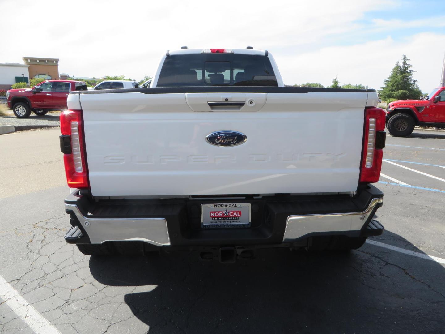 2023 White Ford F-350 SD Lariat Crew Cab Long Bed DRW 4WD (1FT8W3DM9PE) with an 6.7L V8 OHV 16V DIESEL engine, 6A transmission, located at 2630 Grass Valley Highway, Auburn, CA, 95603, (530) 508-5100, 38.937893, -121.095482 - Features a BDS 3" radius arm suspension system, Fox 2.0 shocks, 20" DDC Aftermath wheels, 37" Nitto Ridge Grappler tires, Weathertech Floorliners, DeeZee bed mat, and a Pedal Commander. - Photo#5
