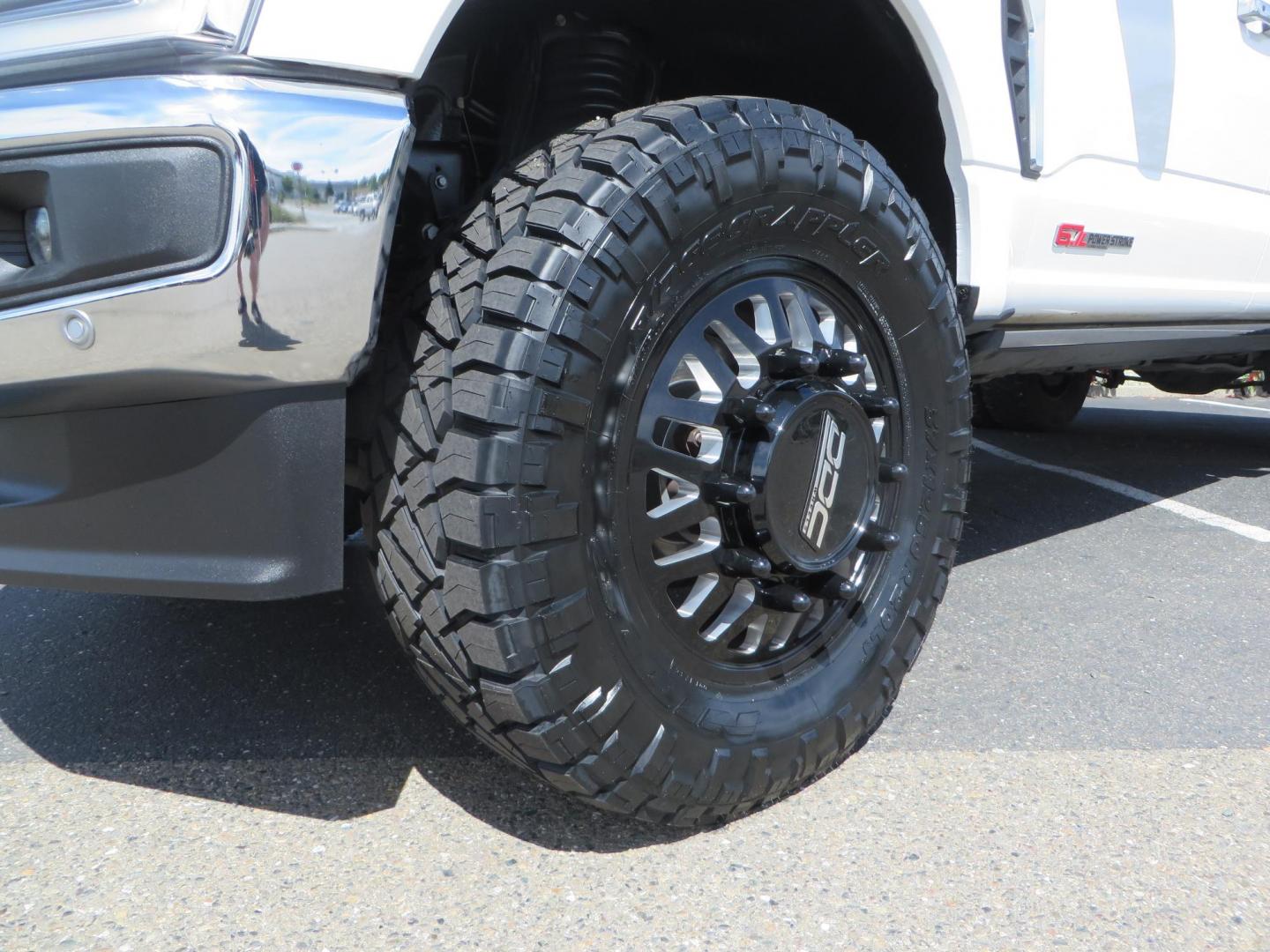 2023 White Ford F-350 SD Lariat Crew Cab Long Bed DRW 4WD (1FT8W3DM9PE) with an 6.7L V8 OHV 16V DIESEL engine, 6A transmission, located at 2630 Grass Valley Highway, Auburn, CA, 95603, (530) 508-5100, 38.937893, -121.095482 - Features a BDS 3" radius arm suspension system, Fox 2.0 shocks, 20" DDC Aftermath wheels, 37" Nitto Ridge Grappler tires, Weathertech Floorliners, DeeZee bed mat, and a Pedal Commander. - Photo#9
