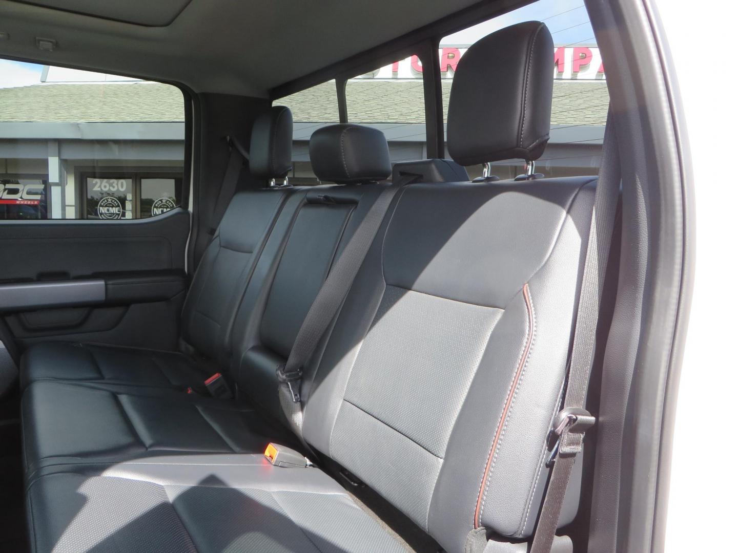 2023 White Ford F-350 SD Lariat Crew Cab Long Bed DRW 4WD (1FT8W3DM9PE) with an 6.7L V8 OHV 16V DIESEL engine, 6A transmission, located at 2630 Grass Valley Highway, Auburn, CA, 95603, (530) 508-5100, 38.937893, -121.095482 - Features a BDS 3" radius arm suspension system, Fox 2.0 shocks, 20" DDC Aftermath wheels, 37" Nitto Ridge Grappler tires, Weathertech Floorliners, DeeZee bed mat, and a Pedal Commander. - Photo#56