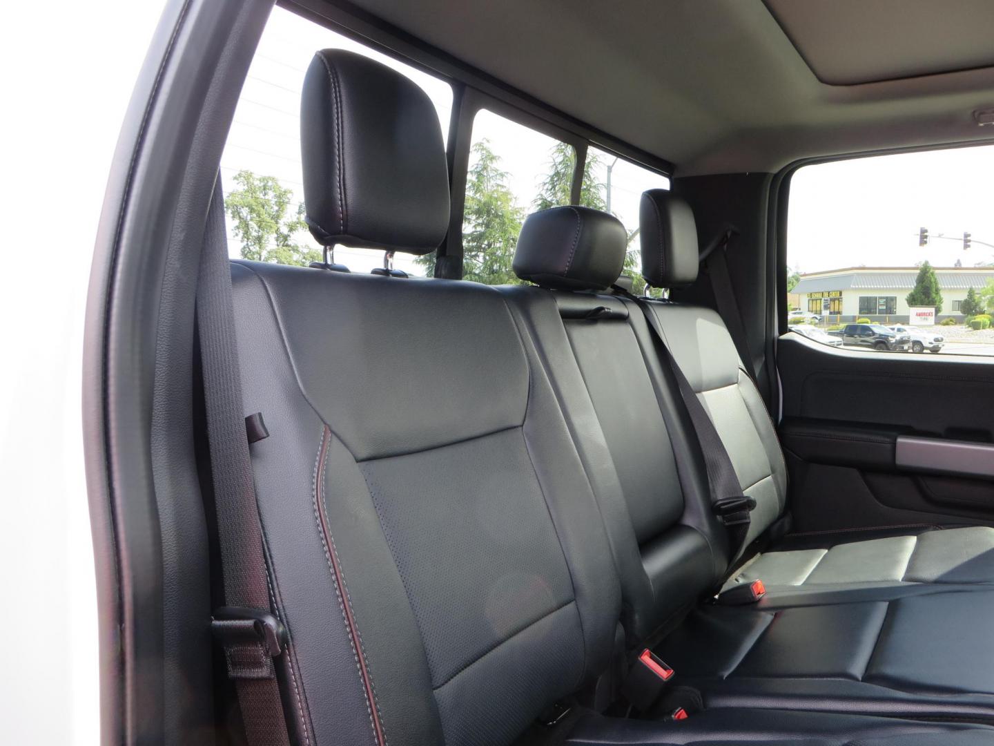 2023 White Ford F-350 SD Lariat Crew Cab Long Bed DRW 4WD (1FT8W3DM9PE) with an 6.7L V8 OHV 16V DIESEL engine, 6A transmission, located at 2630 Grass Valley Highway, Auburn, CA, 95603, (530) 508-5100, 38.937893, -121.095482 - Features a BDS 3" radius arm suspension system, Fox 2.0 shocks, 20" DDC Aftermath wheels, 37" Nitto Ridge Grappler tires, Weathertech Floorliners, DeeZee bed mat, and a Pedal Commander. - Photo#74