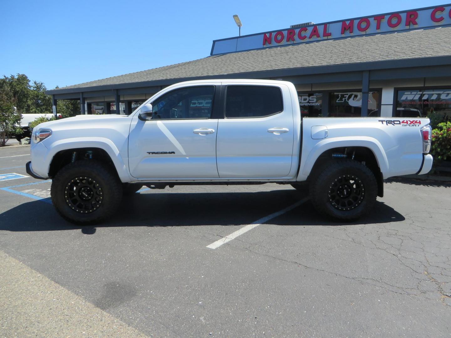 2021 Toyota Tacoma TRD Sport Double Cab Long Bed V6 6AT 4WD (3TYCZ5AN5MT) with an 3.5L V6 DOHC 24V engine, 6A transmission, located at 2630 Grass Valley Highway, Auburn, CA, 95603, (530) 508-5100, 38.937893, -121.095482 - Photo#1