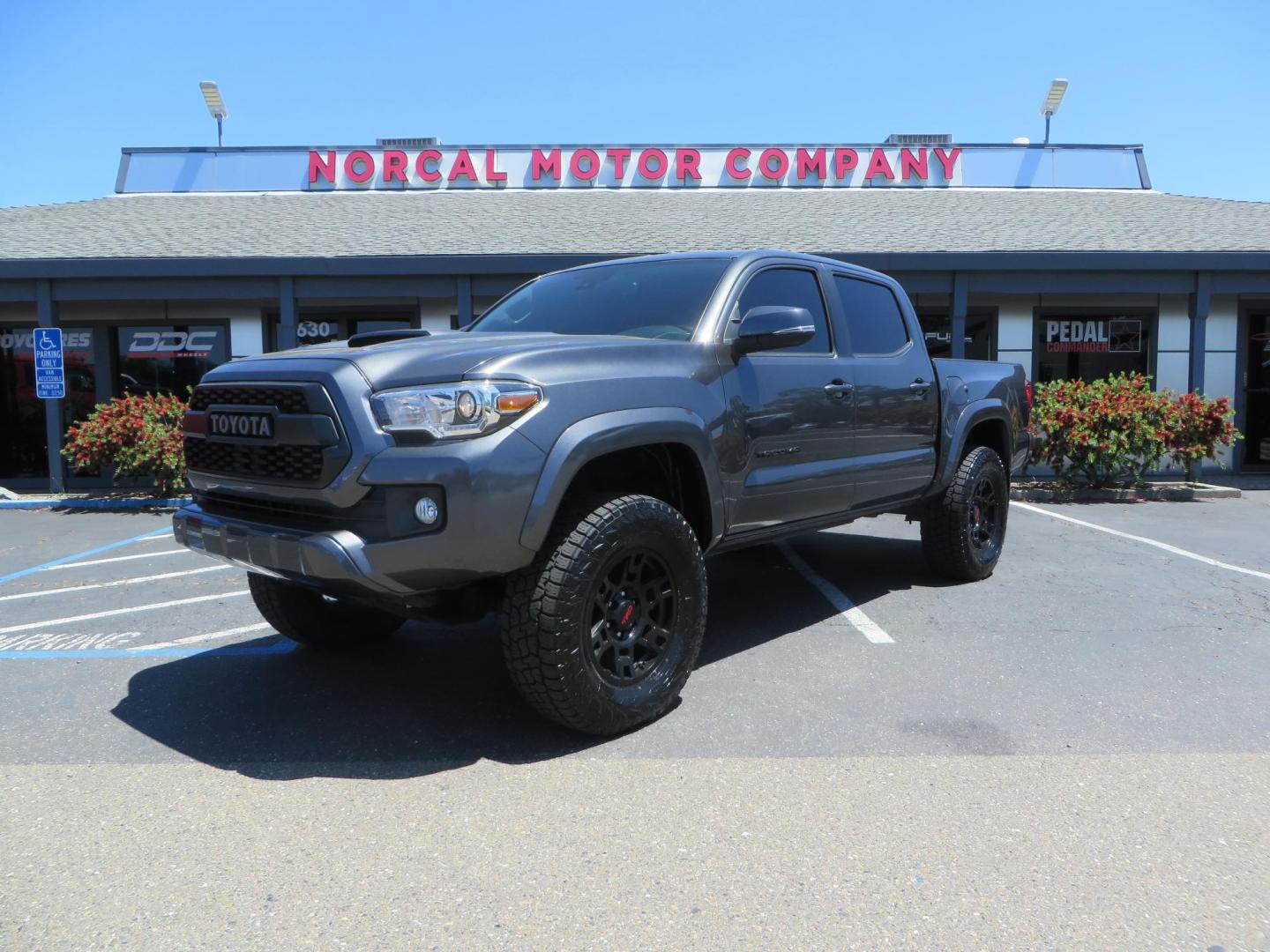 2018 CHARCOAL Toyota Tacoma TRD Sport Double Cab V6 6AT 4WD (3TMCZ5AN1JM) with an 3.6L V6 DOHC 24V engine, 6A transmission, located at 2630 Grass Valley Highway, Auburn, CA, 95603, (530) 508-5100, 38.937893, -121.095482 - Features a level kit, Nitto Terra Grappler G3 tires, TRD exhaust, and window tint. - Photo#0