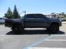 2018 CHARCOAL Toyota Tacoma TRD Sport Double Cab V6 6AT 4WD (3TMCZ5AN1JM) with an 3.6L V6 DOHC 24V engine, 6A transmission, located at 2630 Grass Valley Highway, Auburn, CA, 95603, (530) 508-5100, 38.937893, -121.095482 - Features a level kit, Nitto Terra Grappler G3 tires, TRD exhaust, and window tint. - Photo#3