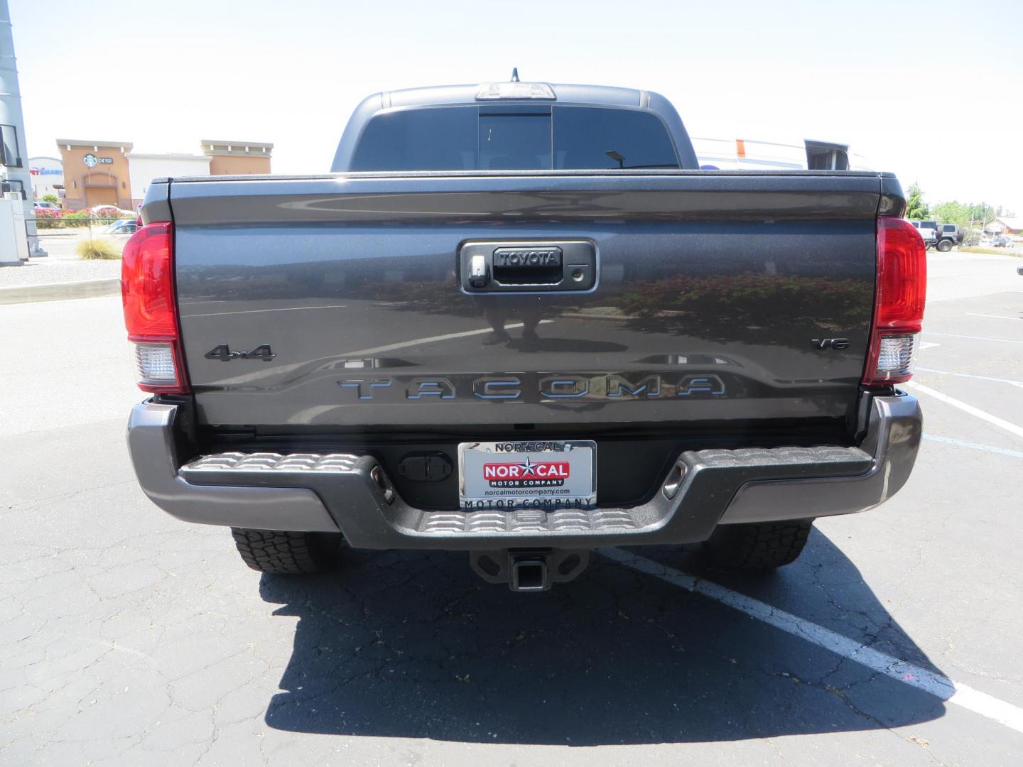 2018 CHARCOAL Toyota Tacoma TRD Sport Double Cab V6 6AT 4WD (3TMCZ5AN1JM) with an 3.6L V6 DOHC 24V engine, 6A transmission, located at 2630 Grass Valley Highway, Auburn, CA, 95603, (530) 508-5100, 38.937893, -121.095482 - Features a level kit, Nitto Terra Grappler G3 tires, TRD exhaust, and window tint. - Photo#5