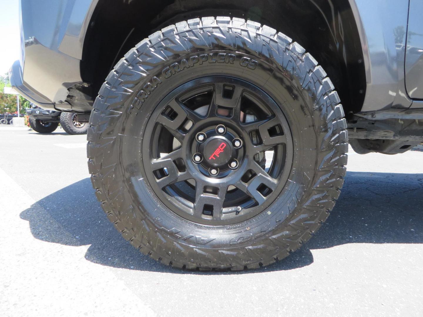 2018 CHARCOAL Toyota Tacoma TRD Sport Double Cab V6 6AT 4WD (3TMCZ5AN1JM) with an 3.6L V6 DOHC 24V engine, 6A transmission, located at 2630 Grass Valley Highway, Auburn, CA, 95603, (530) 508-5100, 38.937893, -121.095482 - Features a level kit, Nitto Terra Grappler G3 tires, TRD exhaust, and window tint. - Photo#8