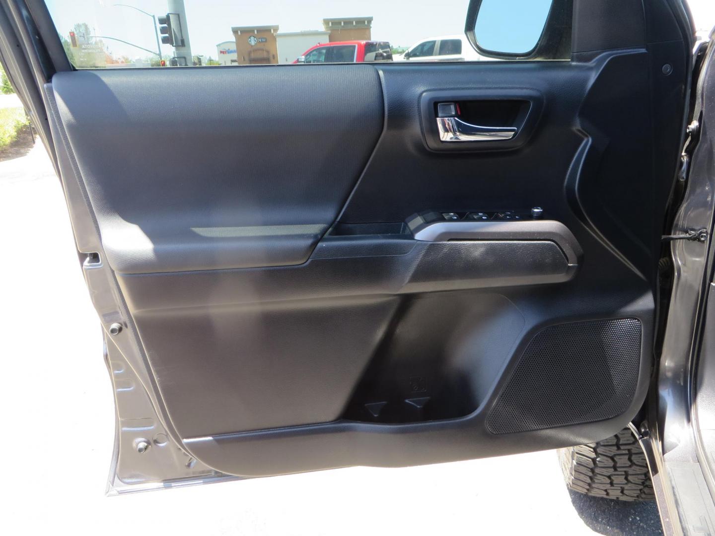 2018 CHARCOAL Toyota Tacoma TRD Sport Double Cab V6 6AT 4WD (3TMCZ5AN1JM) with an 3.6L V6 DOHC 24V engine, 6A transmission, located at 2630 Grass Valley Highway, Auburn, CA, 95603, (530) 508-5100, 38.937893, -121.095482 - Features a level kit, Nitto Terra Grappler G3 tires, TRD exhaust, and window tint. - Photo#14