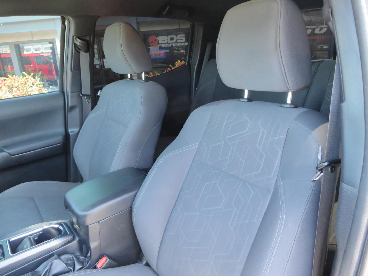 2018 CHARCOAL Toyota Tacoma TRD Sport Double Cab V6 6AT 4WD (3TMCZ5AN1JM) with an 3.6L V6 DOHC 24V engine, 6A transmission, located at 2630 Grass Valley Highway, Auburn, CA, 95603, (530) 508-5100, 38.937893, -121.095482 - Features a level kit, Nitto Terra Grappler G3 tires, TRD exhaust, and window tint. - Photo#17