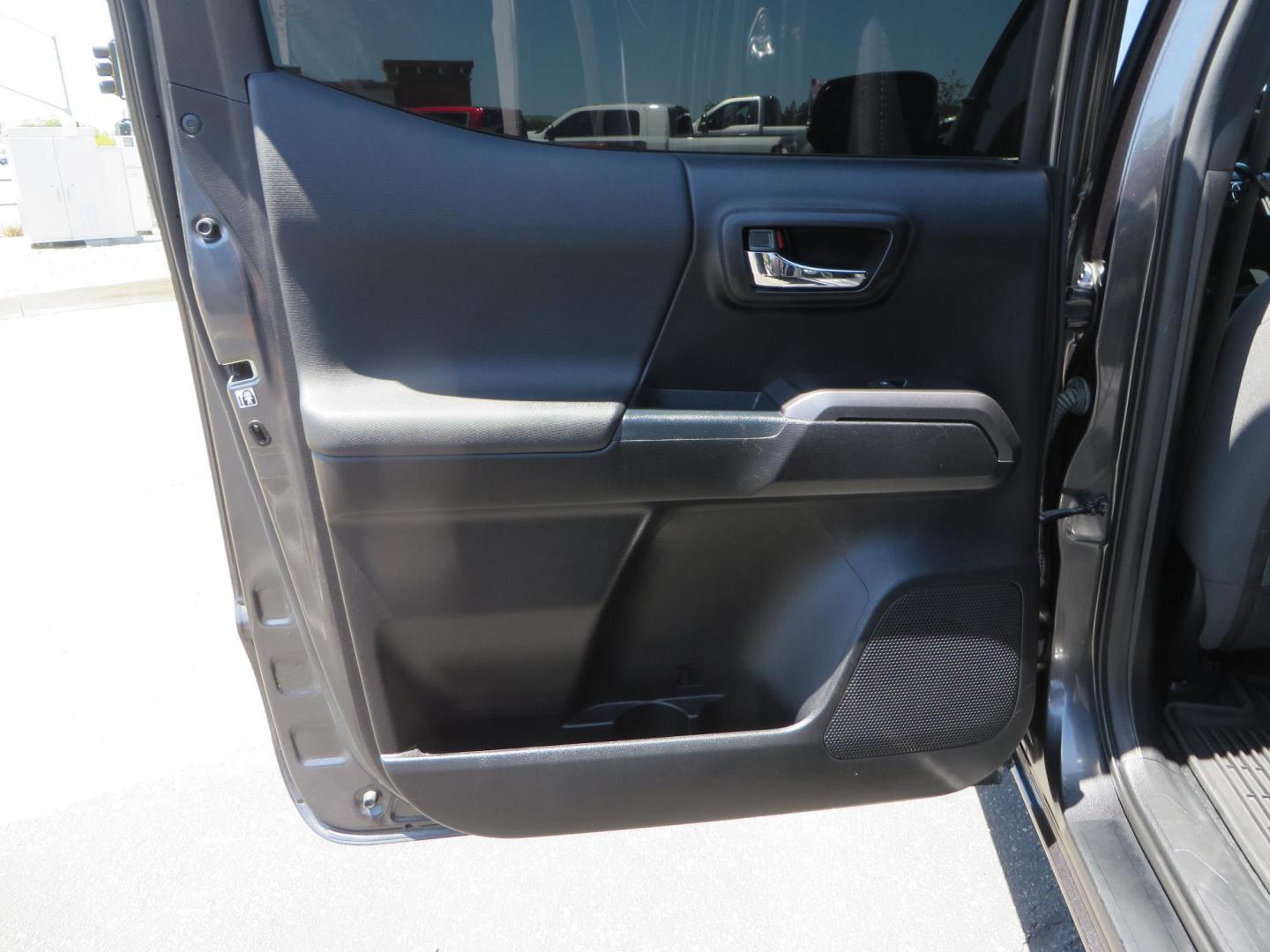 2018 CHARCOAL Toyota Tacoma TRD Sport Double Cab V6 6AT 4WD (3TMCZ5AN1JM) with an 3.6L V6 DOHC 24V engine, 6A transmission, located at 2630 Grass Valley Highway, Auburn, CA, 95603, (530) 508-5100, 38.937893, -121.095482 - Features a level kit, Nitto Terra Grappler G3 tires, TRD exhaust, and window tint. - Photo#34