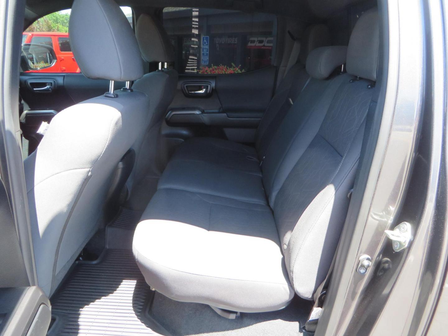 2018 CHARCOAL Toyota Tacoma TRD Sport Double Cab V6 6AT 4WD (3TMCZ5AN1JM) with an 3.6L V6 DOHC 24V engine, 6A transmission, located at 2630 Grass Valley Highway, Auburn, CA, 95603, (530) 508-5100, 38.937893, -121.095482 - Features a level kit, Nitto Terra Grappler G3 tires, TRD exhaust, and window tint. - Photo#36
