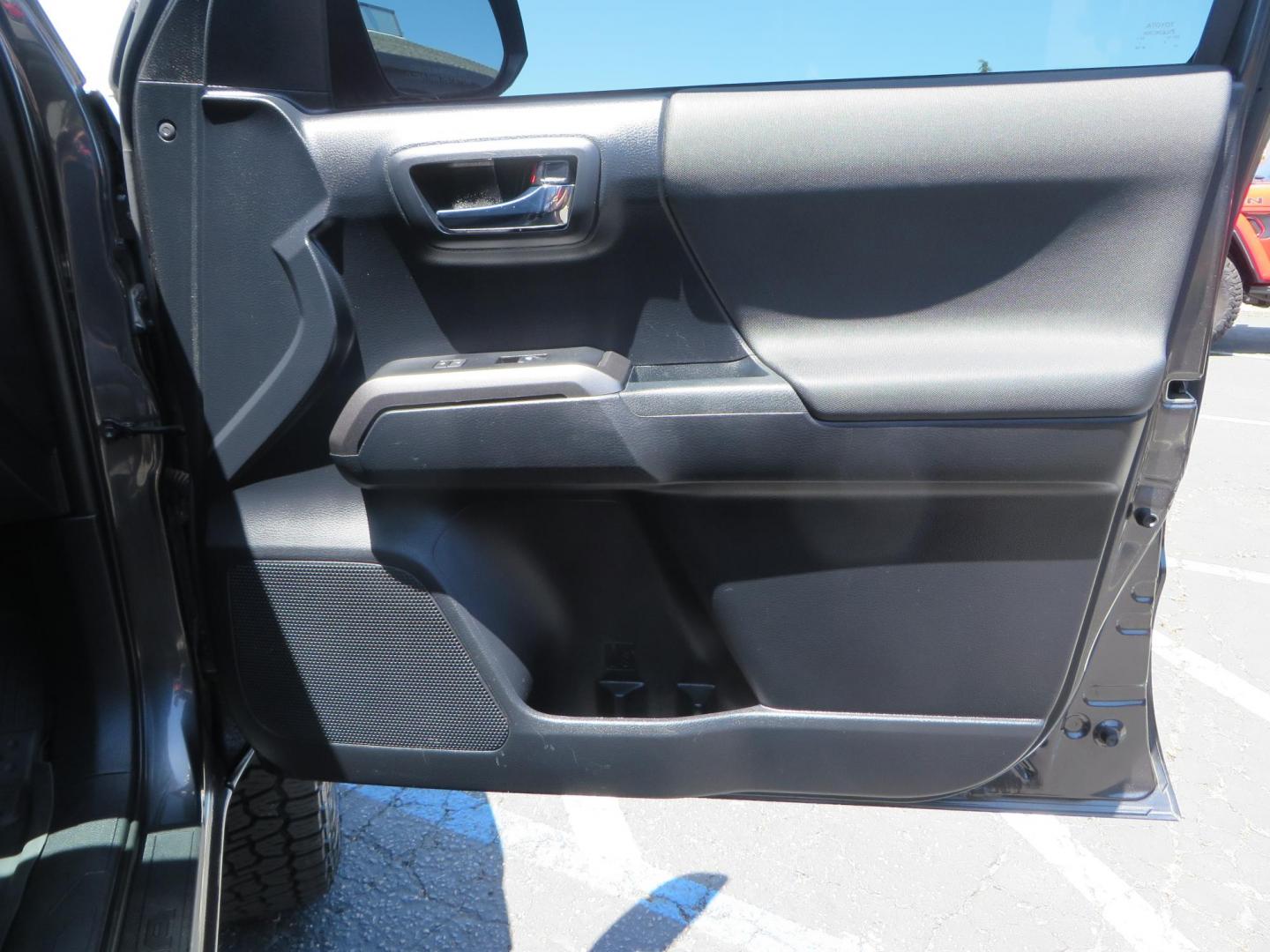 2018 CHARCOAL Toyota Tacoma TRD Sport Double Cab V6 6AT 4WD (3TMCZ5AN1JM) with an 3.6L V6 DOHC 24V engine, 6A transmission, located at 2630 Grass Valley Highway, Auburn, CA, 95603, (530) 508-5100, 38.937893, -121.095482 - Features a level kit, Nitto Terra Grappler G3 tires, TRD exhaust, and window tint. - Photo#41