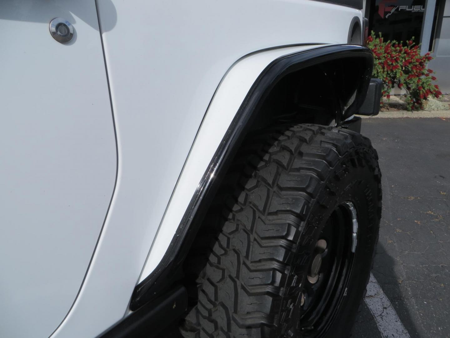 2013 White Jeep Wrangler Rubicon 4WD (1C4BJWCGXDL) with an 3.6L V6 DOHC 24V FFV engine, located at 2630 Grass Valley Highway, Auburn, CA, 95603, (530) 508-5100, 38.937893, -121.095482 - Features a Metal Cloak suspension system, Old Man EMU shocks, Ruff Stuff differential covers, Synergy steering upgrade, 37" Mickey Thompson Baja Boss tires, 17" Steel wheels, Genright front bumper, Badland Winch, LED lights, Rear Bumper, Teraflex Ice Chest rack, HIgh LIft Jack, Jerry Can mount, D Ri - Photo#23