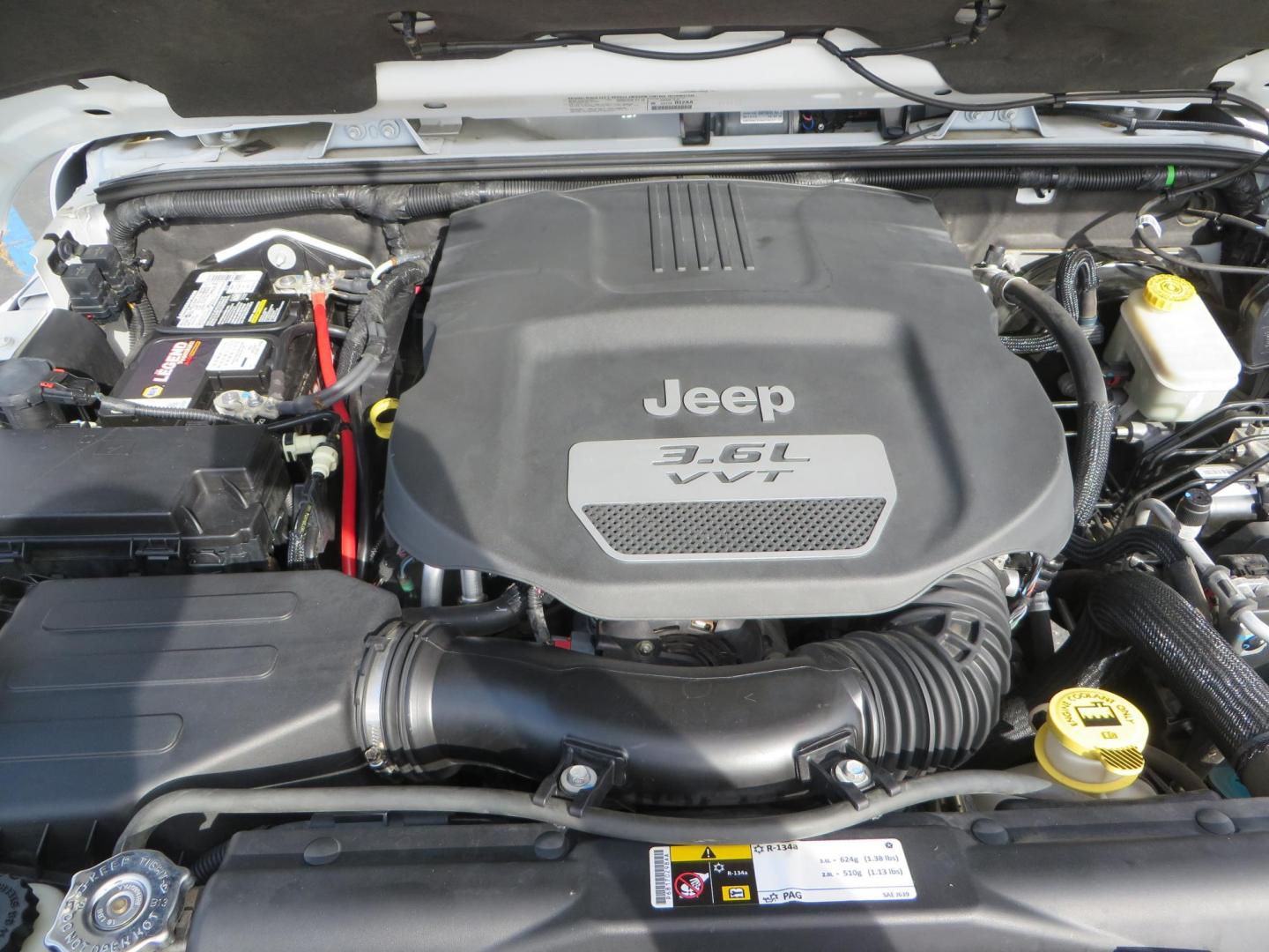 2013 White Jeep Wrangler Rubicon 4WD (1C4BJWCGXDL) with an 3.6L V6 DOHC 24V FFV engine, located at 2630 Grass Valley Highway, Auburn, CA, 95603, (530) 508-5100, 38.937893, -121.095482 - Features a Metal Cloak suspension system, Old Man EMU shocks, Ruff Stuff differential covers, Synergy steering upgrade, 37" Mickey Thompson Baja Boss tires, 17" Steel wheels, Genright front bumper, Badland Winch, LED lights, Rear Bumper, Teraflex Ice Chest rack, HIgh LIft Jack, Jerry Can mount, D Ri - Photo#24