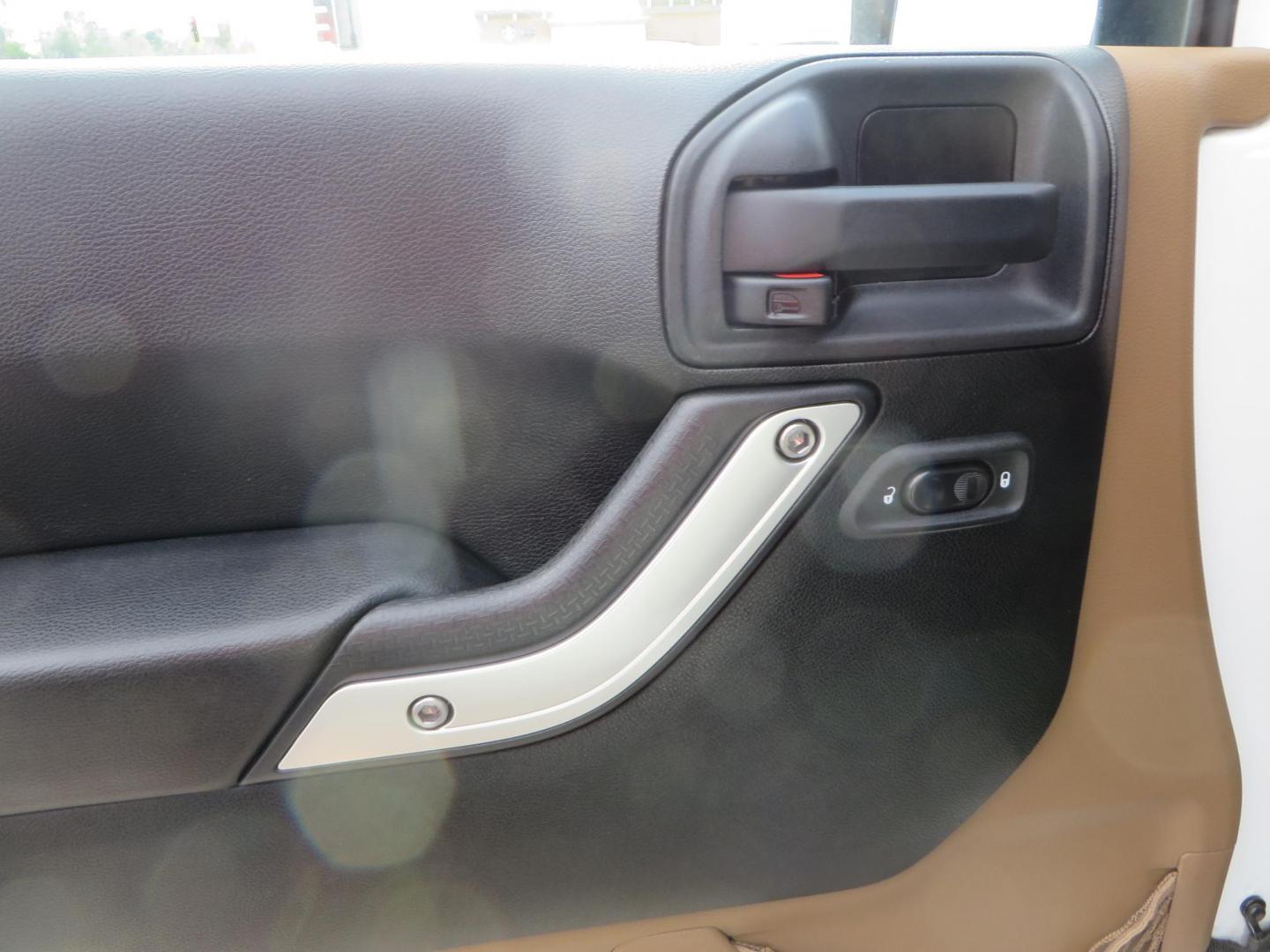 2013 White Jeep Wrangler Rubicon 4WD (1C4BJWCGXDL) with an 3.6L V6 DOHC 24V FFV engine, located at 2630 Grass Valley Highway, Auburn, CA, 95603, (530) 508-5100, 38.937893, -121.095482 - Features a Metal Cloak suspension system, Old Man EMU shocks, Ruff Stuff differential covers, Synergy steering upgrade, 37" Mickey Thompson Baja Boss tires, 17" Steel wheels, Genright front bumper, Badland Winch, LED lights, Rear Bumper, Teraflex Ice Chest rack, HIgh LIft Jack, Jerry Can mount, D Ri - Photo#27