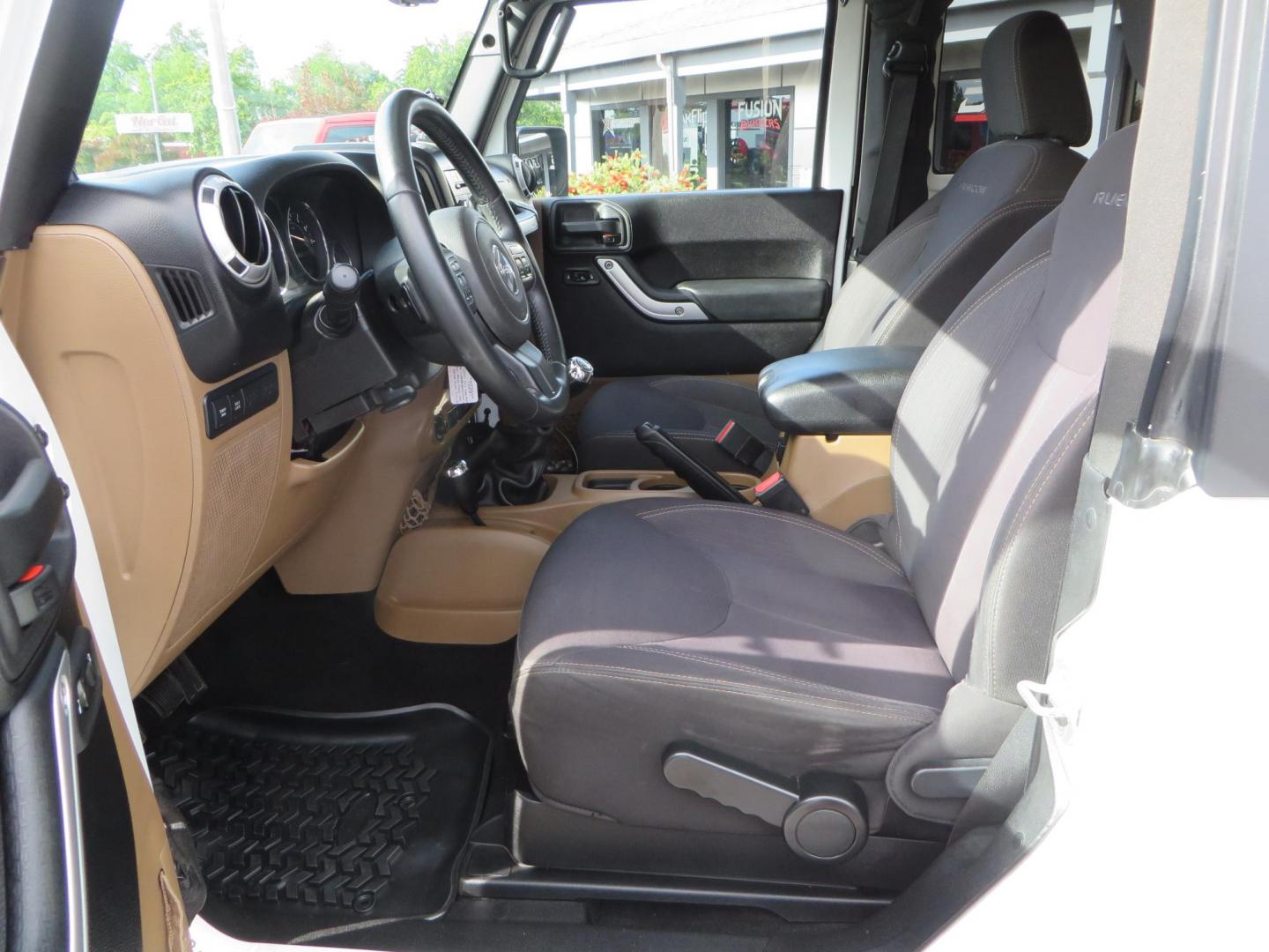 2013 White Jeep Wrangler Rubicon 4WD (1C4BJWCGXDL) with an 3.6L V6 DOHC 24V FFV engine, located at 2630 Grass Valley Highway, Auburn, CA, 95603, (530) 508-5100, 38.937893, -121.095482 - Features a Metal Cloak suspension system, Old Man EMU shocks, Ruff Stuff differential covers, Synergy steering upgrade, 37" Mickey Thompson Baja Boss tires, 17" Steel wheels, Genright front bumper, Badland Winch, LED lights, Rear Bumper, Teraflex Ice Chest rack, HIgh LIft Jack, Jerry Can mount, D Ri - Photo#28