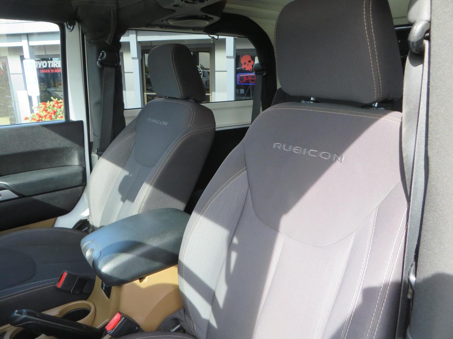 2013 White Jeep Wrangler Rubicon 4WD (1C4BJWCGXDL) with an 3.6L V6 DOHC 24V FFV engine, located at 2630 Grass Valley Highway, Auburn, CA, 95603, (530) 508-5100, 38.937893, -121.095482 - Features a Metal Cloak suspension system, Old Man EMU shocks, Ruff Stuff differential covers, Synergy steering upgrade, 37" Mickey Thompson Baja Boss tires, 17" Steel wheels, Genright front bumper, Badland Winch, LED lights, Rear Bumper, Teraflex Ice Chest rack, HIgh LIft Jack, Jerry Can mount, D Ri - Photo#29