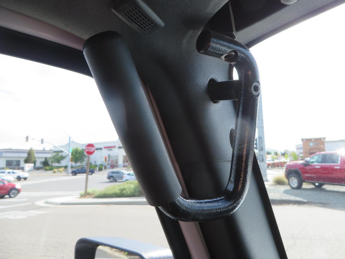 2013 White Jeep Wrangler Rubicon 4WD (1C4BJWCGXDL) with an 3.6L V6 DOHC 24V FFV engine, located at 2630 Grass Valley Highway, Auburn, CA, 95603, (530) 508-5100, 38.937893, -121.095482 - Features a Metal Cloak suspension system, Old Man EMU shocks, Ruff Stuff differential covers, Synergy steering upgrade, 37" Mickey Thompson Baja Boss tires, 17" Steel wheels, Genright front bumper, Badland Winch, LED lights, Rear Bumper, Teraflex Ice Chest rack, HIgh LIft Jack, Jerry Can mount, D Ri - Photo#44