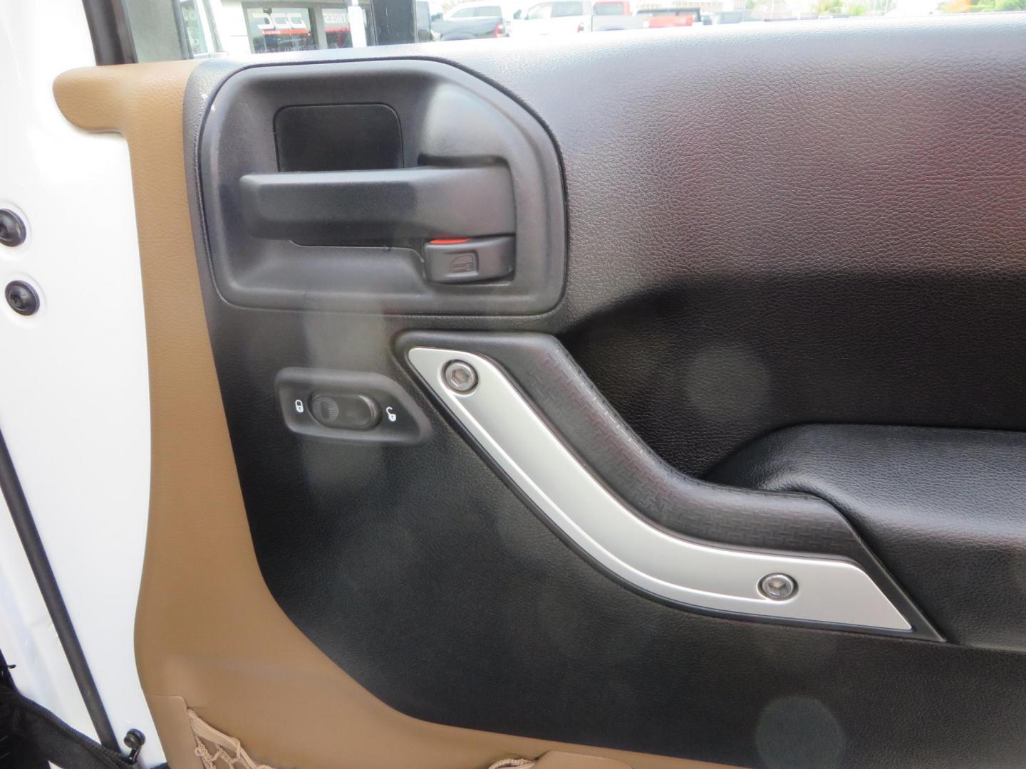 2013 White Jeep Wrangler Rubicon 4WD (1C4BJWCGXDL) with an 3.6L V6 DOHC 24V FFV engine, located at 2630 Grass Valley Highway, Auburn, CA, 95603, (530) 508-5100, 38.937893, -121.095482 - Features a Metal Cloak suspension system, Old Man EMU shocks, Ruff Stuff differential covers, Synergy steering upgrade, 37" Mickey Thompson Baja Boss tires, 17" Steel wheels, Genright front bumper, Badland Winch, LED lights, Rear Bumper, Teraflex Ice Chest rack, HIgh LIft Jack, Jerry Can mount, D Ri - Photo#48
