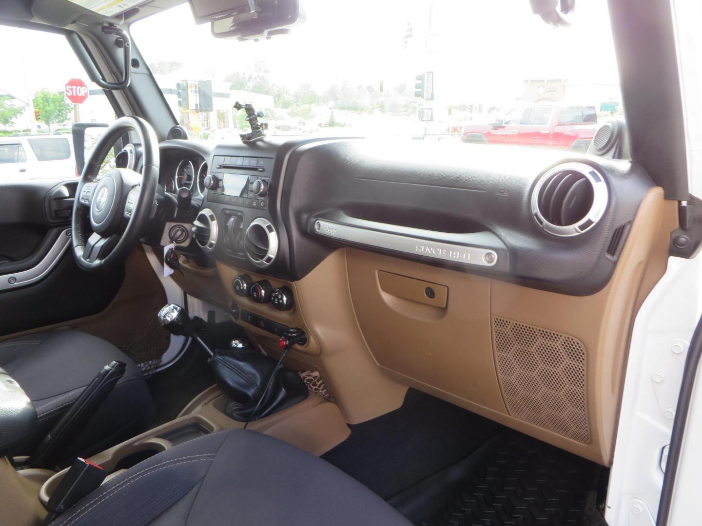 2013 White Jeep Wrangler Rubicon 4WD (1C4BJWCGXDL) with an 3.6L V6 DOHC 24V FFV engine, located at 2630 Grass Valley Highway, Auburn, CA, 95603, (530) 508-5100, 38.937893, -121.095482 - Features a Metal Cloak suspension system, Old Man EMU shocks, Ruff Stuff differential covers, Synergy steering upgrade, 37" Mickey Thompson Baja Boss tires, 17" Steel wheels, Genright front bumper, Badland Winch, LED lights, Rear Bumper, Teraflex Ice Chest rack, HIgh LIft Jack, Jerry Can mount, D Ri - Photo#52