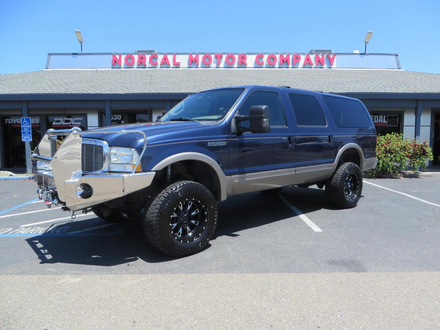 2003 Blue Ford Excursion Eddie Bauer 6.0L 4WD (1FMSU45PX3E) with an 6.0L V8 OHV 32V TURBO DIESEL engine, 5-Speed Automatic Overdrive transmission, located at 2630 Grass Valley Highway, Auburn, CA, 95603, (530) 508-5100, 38.937893, -121.095482 - Rare to find an Excursion especially like this... Extremely Clean 6.0L with ARP head studs, aluminum radiator, Lifted, Fuel wheels, Open Range AT tires, Bilstein Shocks, Amp power steps, Custom front and rear bumpers, 15K Warn Winch, Piaa Lights, RV Towable, Brake Controller, Edge Tuner CA legal, Ex - Photo#0