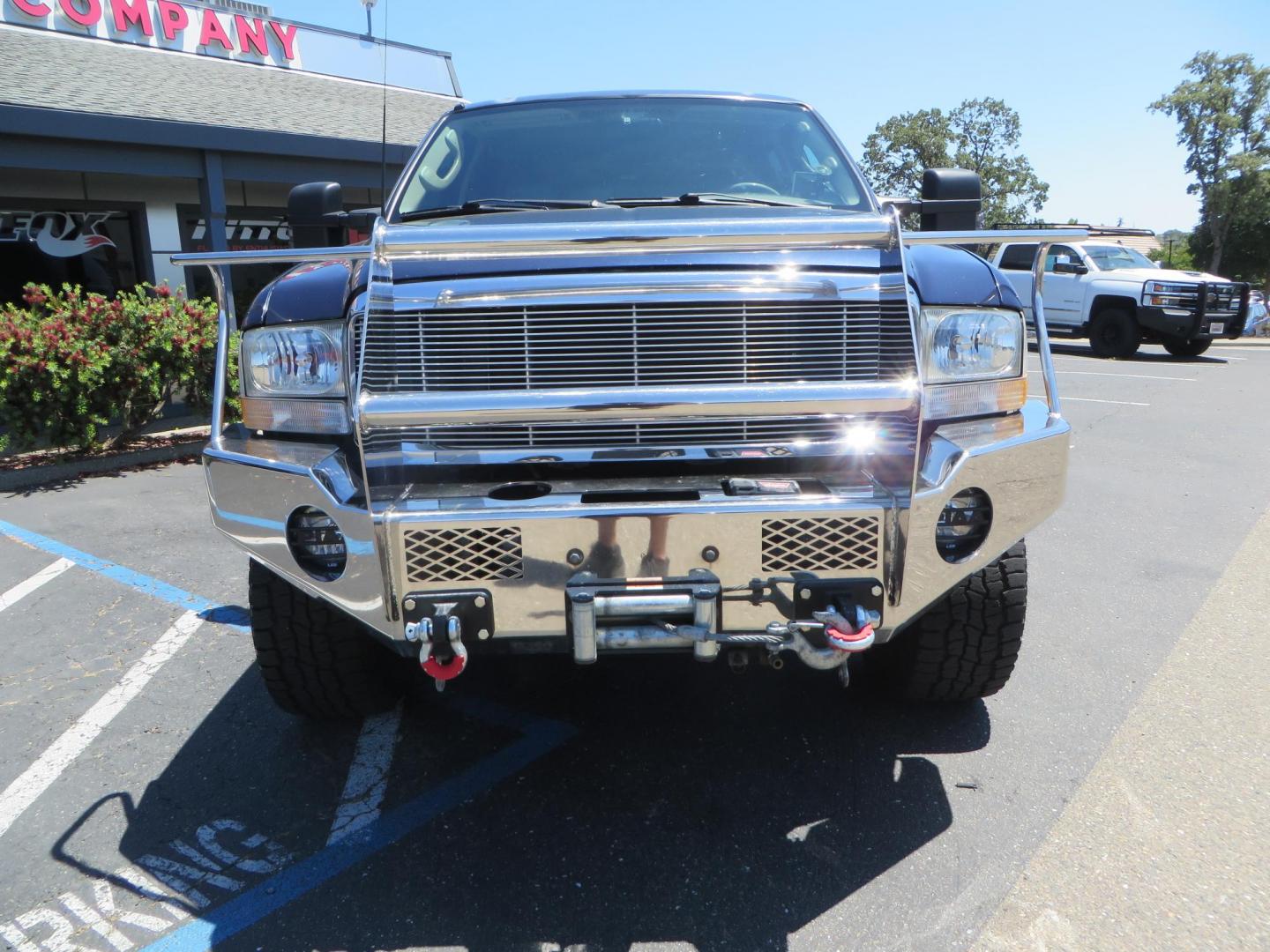 2003 Blue Ford Excursion Eddie Bauer 6.0L 4WD (1FMSU45PX3E) with an 6.0L V8 OHV 32V TURBO DIESEL engine, 5-Speed Automatic Overdrive transmission, located at 2630 Grass Valley Highway, Auburn, CA, 95603, (530) 508-5100, 38.937893, -121.095482 - Rare to find an Excursion especially like this... Extremely Clean 6.0L with ARP head studs, aluminum radiator, Lifted, Fuel wheels, Open Range AT tires, Bilstein Shocks, Amp power steps, Custom front and rear bumpers, 15K Warn Winch, Piaa Lights, RV Towable, Brake Controller, Edge Tuner CA legal, Ex - Photo#1