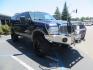 2003 Blue Ford Excursion Eddie Bauer 6.0L 4WD (1FMSU45PX3E) with an 6.0L V8 OHV 32V TURBO DIESEL engine, 5-Speed Automatic Overdrive transmission, located at 2630 Grass Valley Highway, Auburn, CA, 95603, (530) 508-5100, 38.937893, -121.095482 - Rare to find an Excursion especially like this... Extremely Clean 6.0L with ARP head studs, aluminum radiator, Lifted, Fuel wheels, Open Range AT tires, Bilstein Shocks, Amp power steps, Custom front and rear bumpers, 15K Warn Winch, Piaa Lights, RV Towable, Brake Controller, Edge Tuner CA legal, Ex - Photo#2