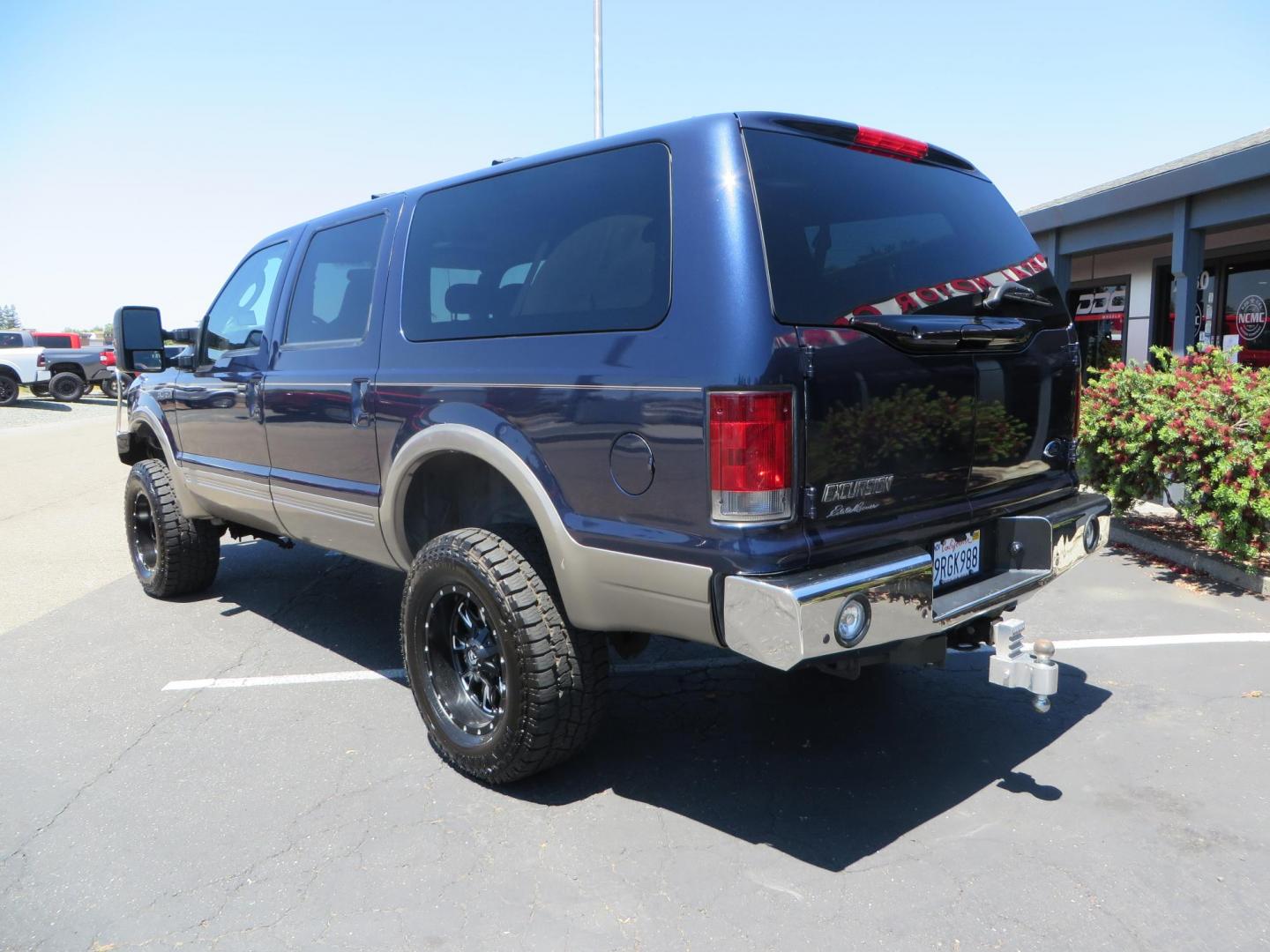2003 Blue Ford Excursion Eddie Bauer 6.0L 4WD (1FMSU45PX3E) with an 6.0L V8 OHV 32V TURBO DIESEL engine, 5-Speed Automatic Overdrive transmission, located at 2630 Grass Valley Highway, Auburn, CA, 95603, (530) 508-5100, 38.937893, -121.095482 - Rare to find an Excursion especially like this... Extremely Clean 6.0L with ARP head studs, aluminum radiator, Lifted, Fuel wheels, Open Range AT tires, Bilstein Shocks, Amp power steps, Custom front and rear bumpers, 15K Warn Winch, Piaa Lights, RV Towable, Brake Controller, Edge Tuner CA legal, Ex - Photo#6