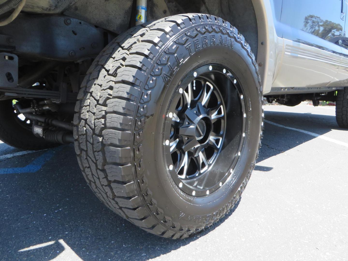 2003 Blue Ford Excursion Eddie Bauer 6.0L 4WD (1FMSU45PX3E) with an 6.0L V8 OHV 32V TURBO DIESEL engine, 5-Speed Automatic Overdrive transmission, located at 2630 Grass Valley Highway, Auburn, CA, 95603, (530) 508-5100, 38.937893, -121.095482 - Rare to find an Excursion especially like this... Extremely Clean 6.0L with ARP head studs, aluminum radiator, Lifted, Fuel wheels, Open Range AT tires, Bilstein Shocks, Amp power steps, Custom front and rear bumpers, 15K Warn Winch, Piaa Lights, RV Towable, Brake Controller, Edge Tuner CA legal, Ex - Photo#9